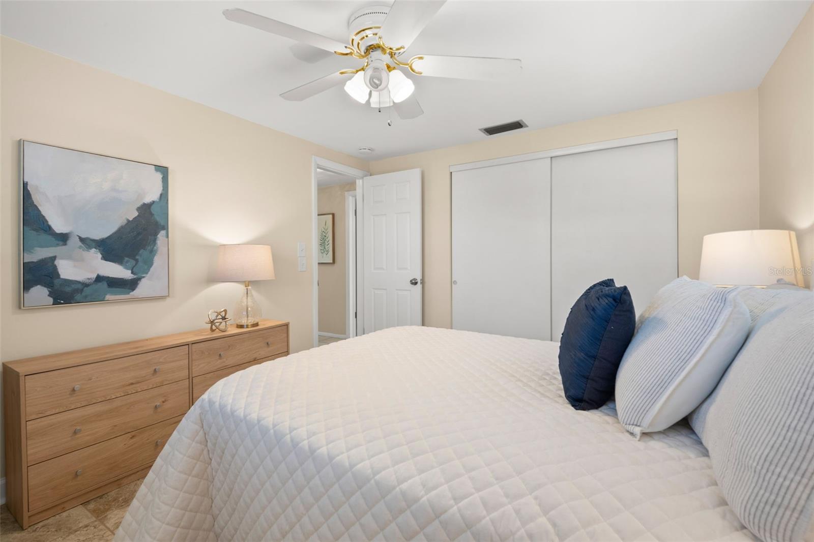 Primary bedroom with generous closet space