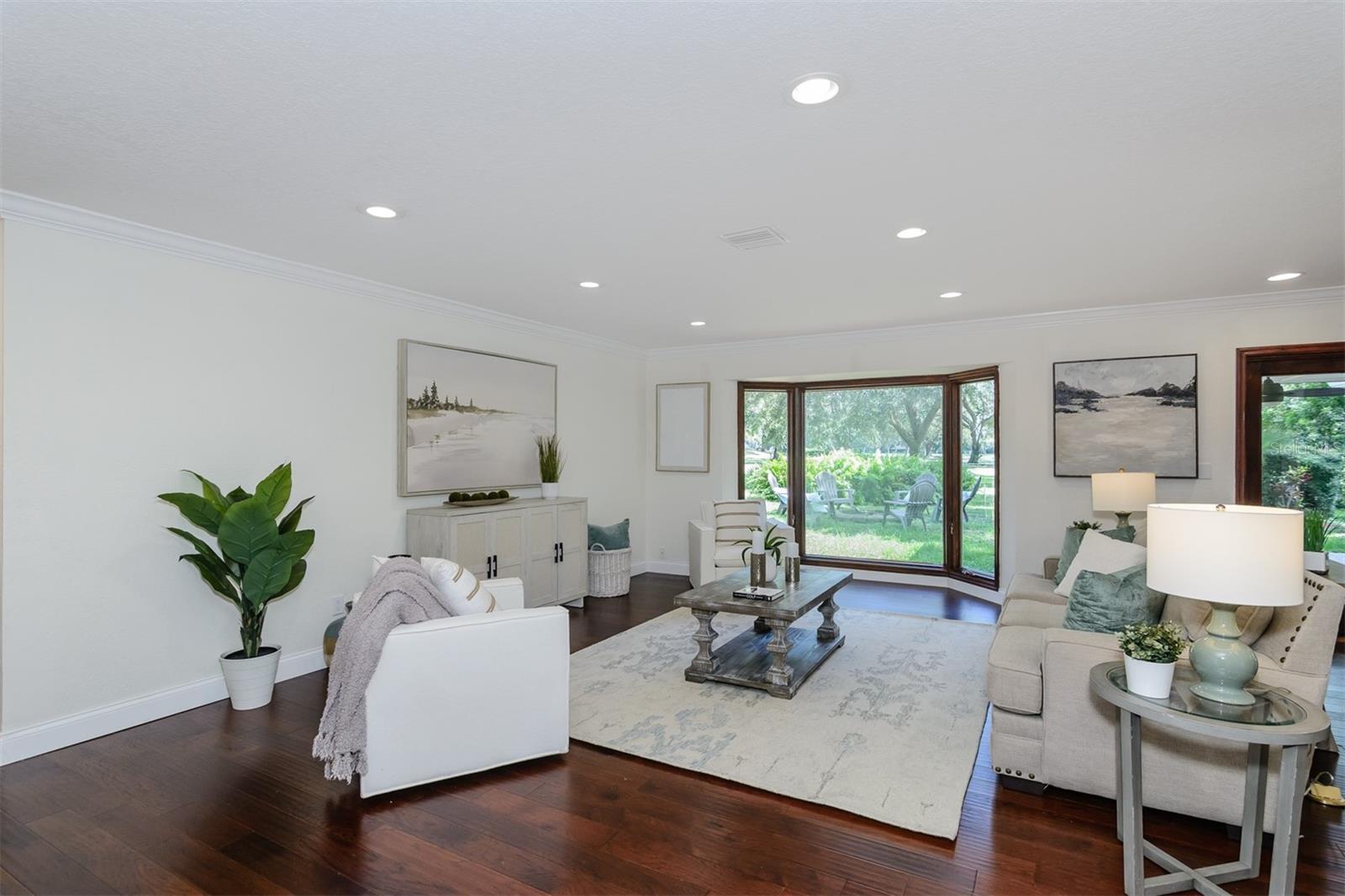 Great Room featuring Hand Scraped Wood Floors