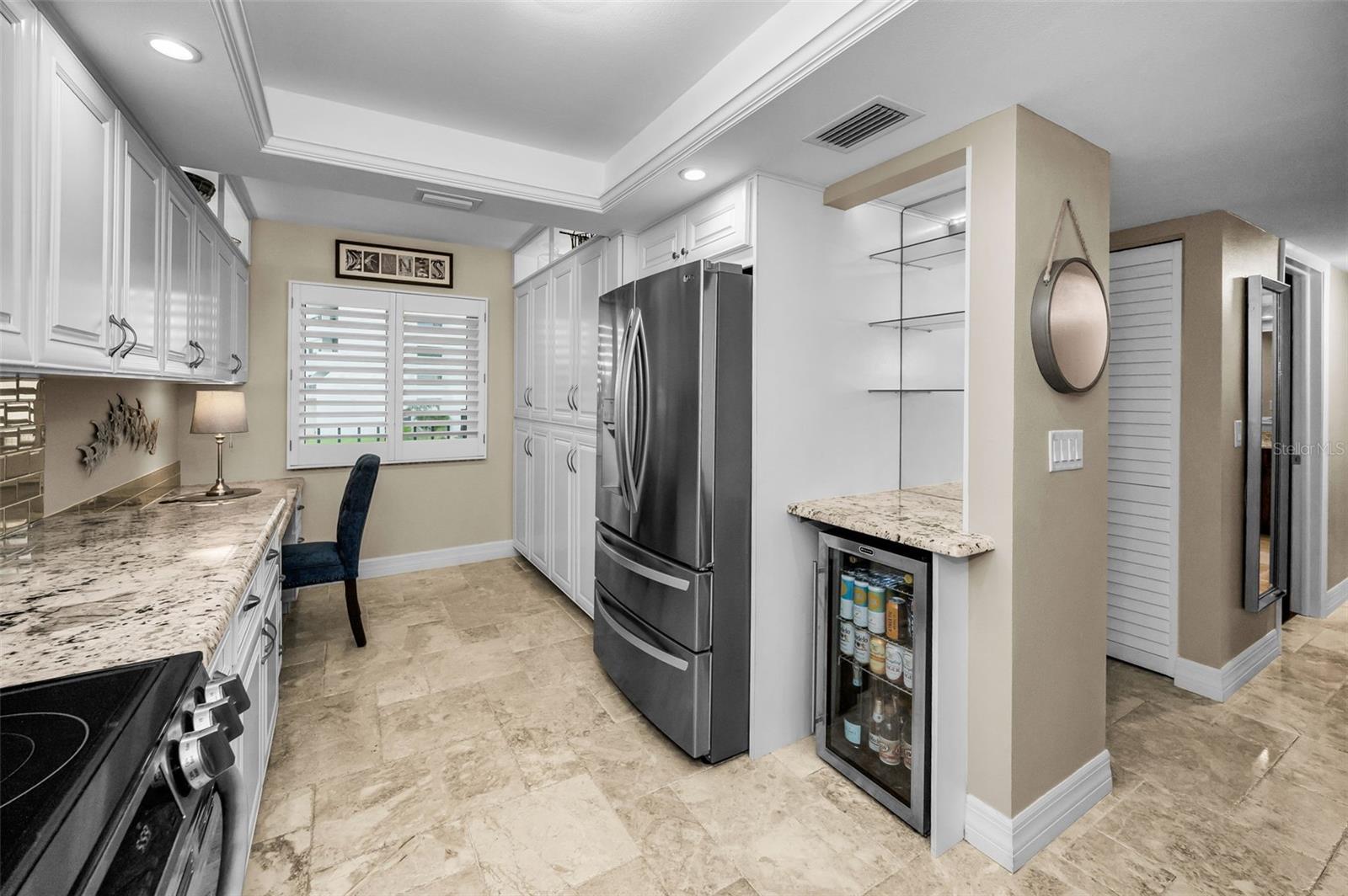 Built-in bar with room for beverage or wine cooler
