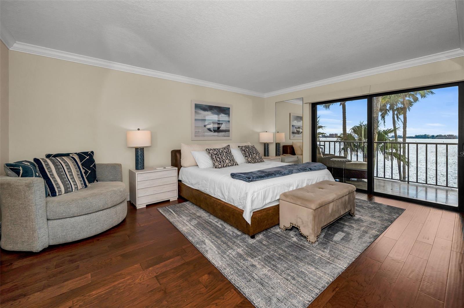 Primary Bedroom with sliders leading to balcony