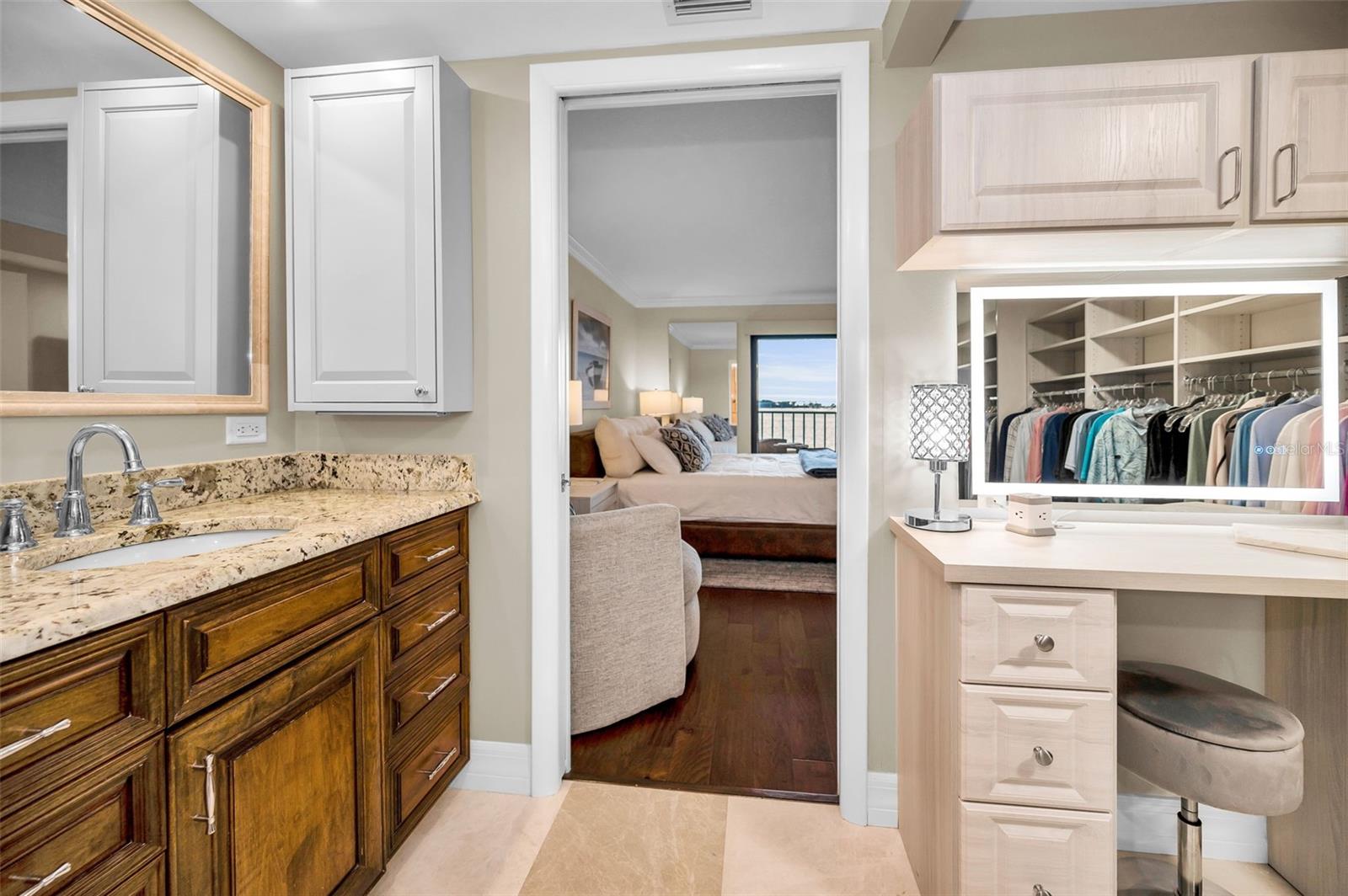Custom make-up station in primary bedroom walk-in closet