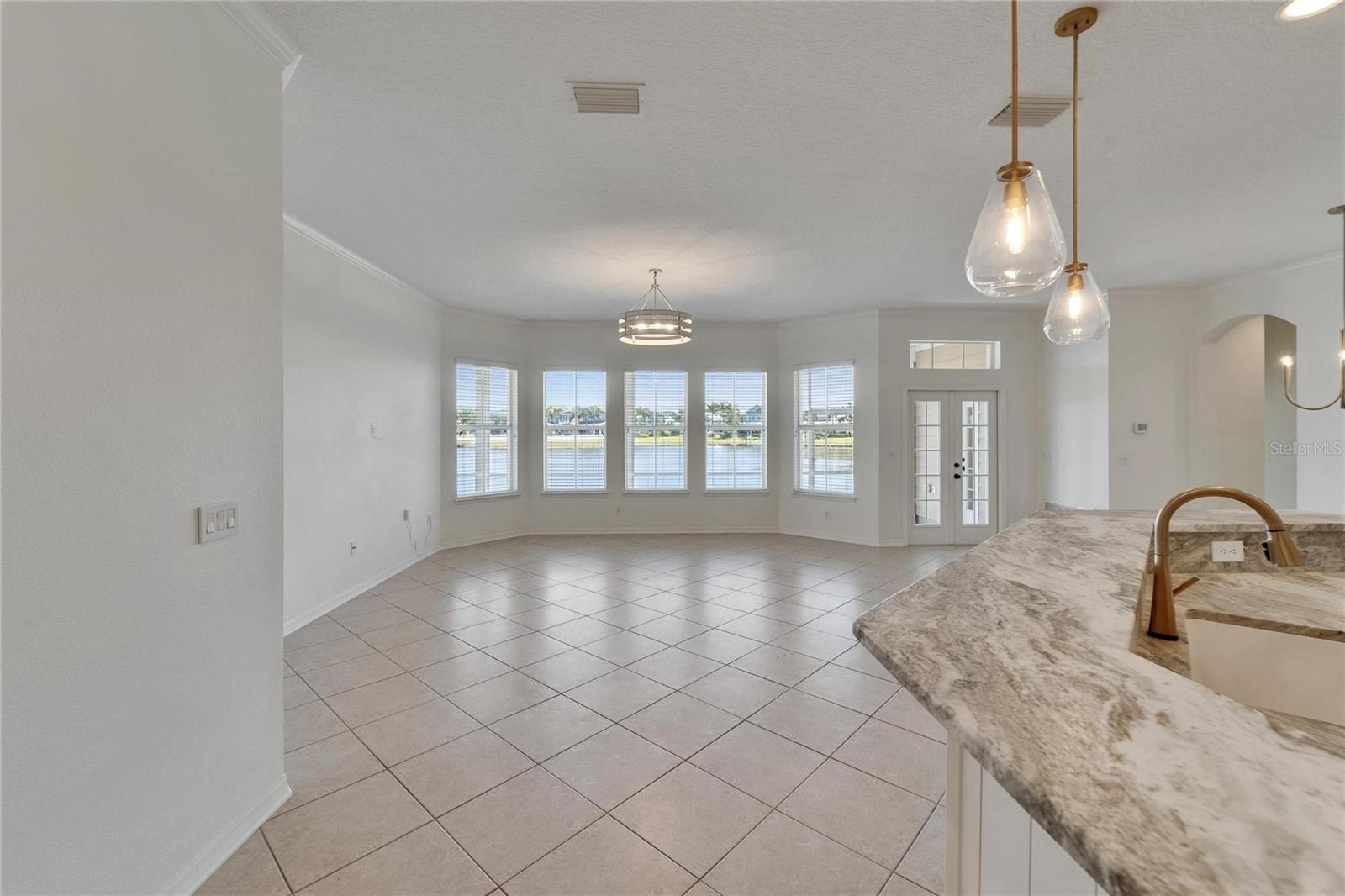 Family room with natural light overlooking the lagoon