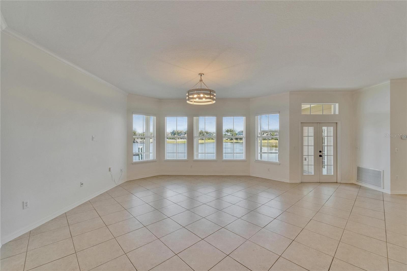 Lots of natural light in the family room with french door out to back covered porch area