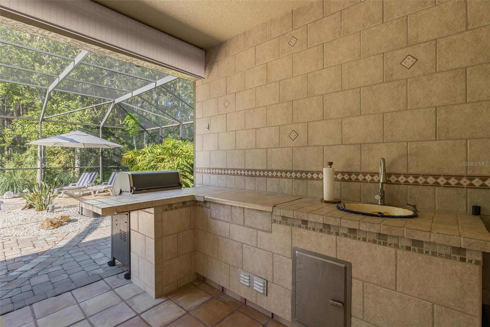 Outdoor kitchen plumbed for your grill