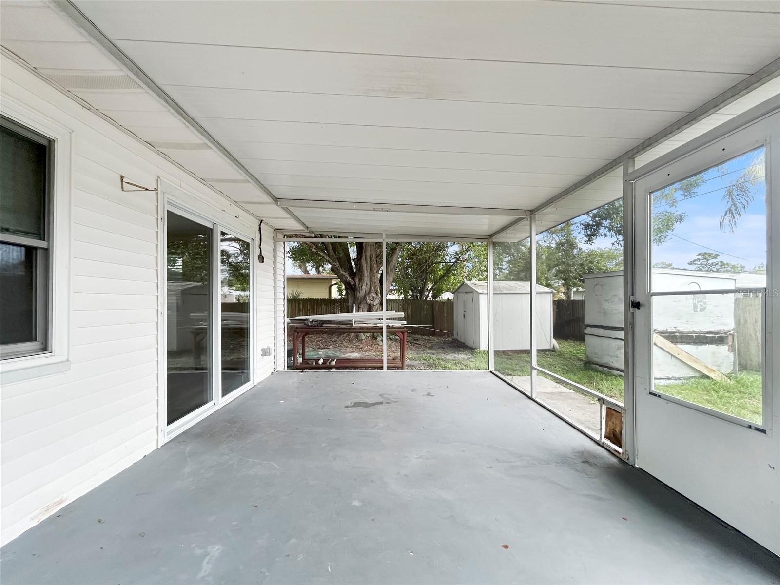 Rear Screened In Sun Room