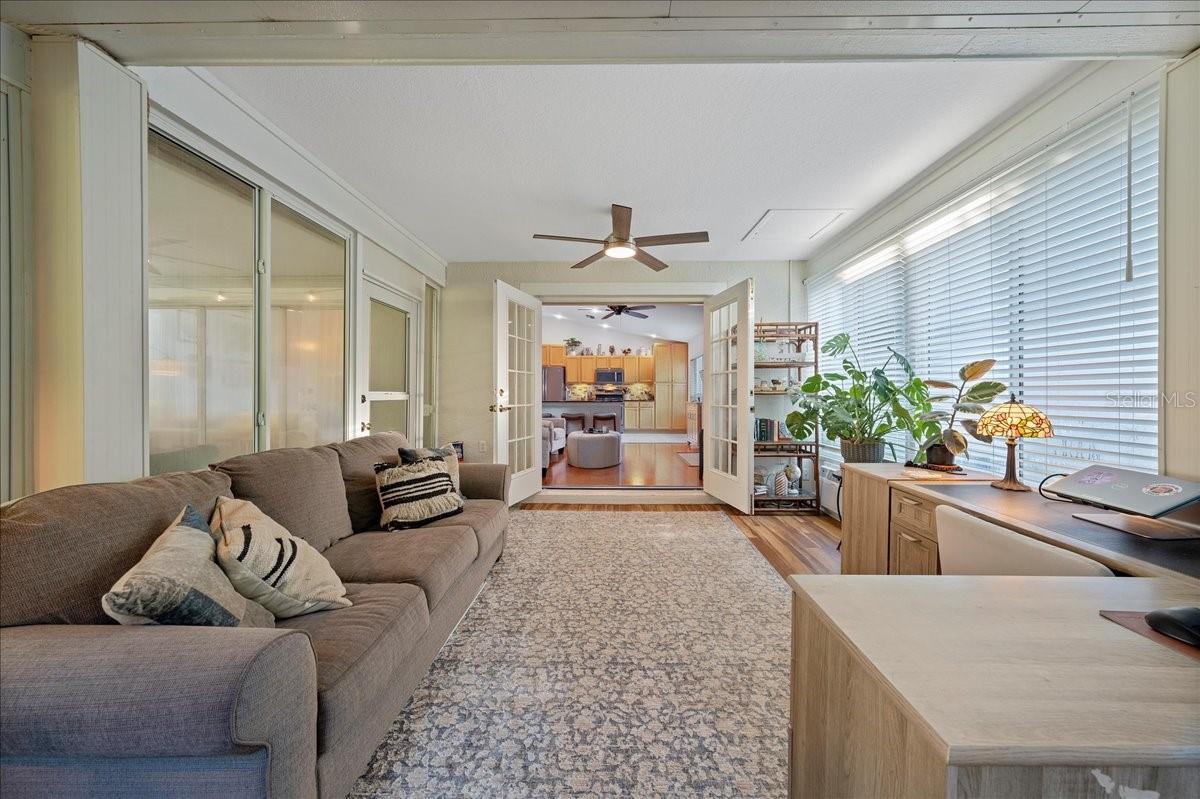 Florida room with AC, window surround. Ideal for home office, play room, reading and relaxing or flex space.