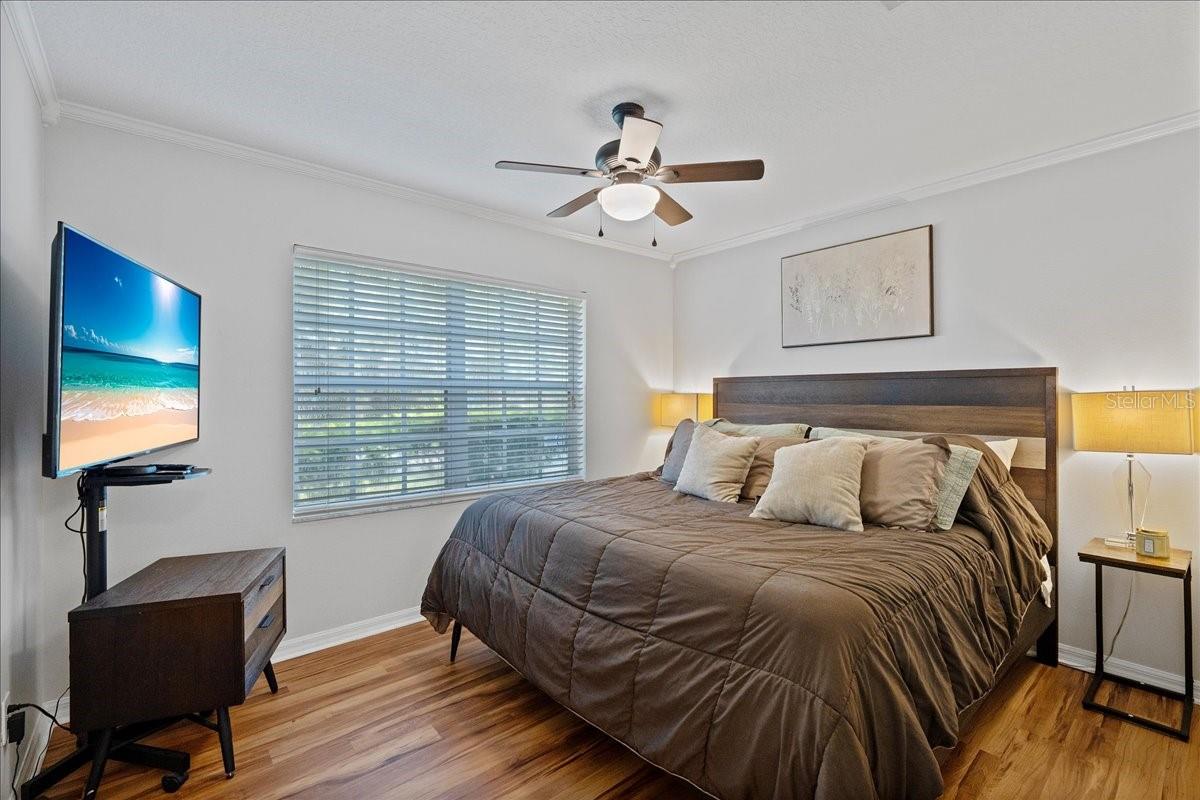 Second bedroom at the front of the home with new luxury vinyl flooring