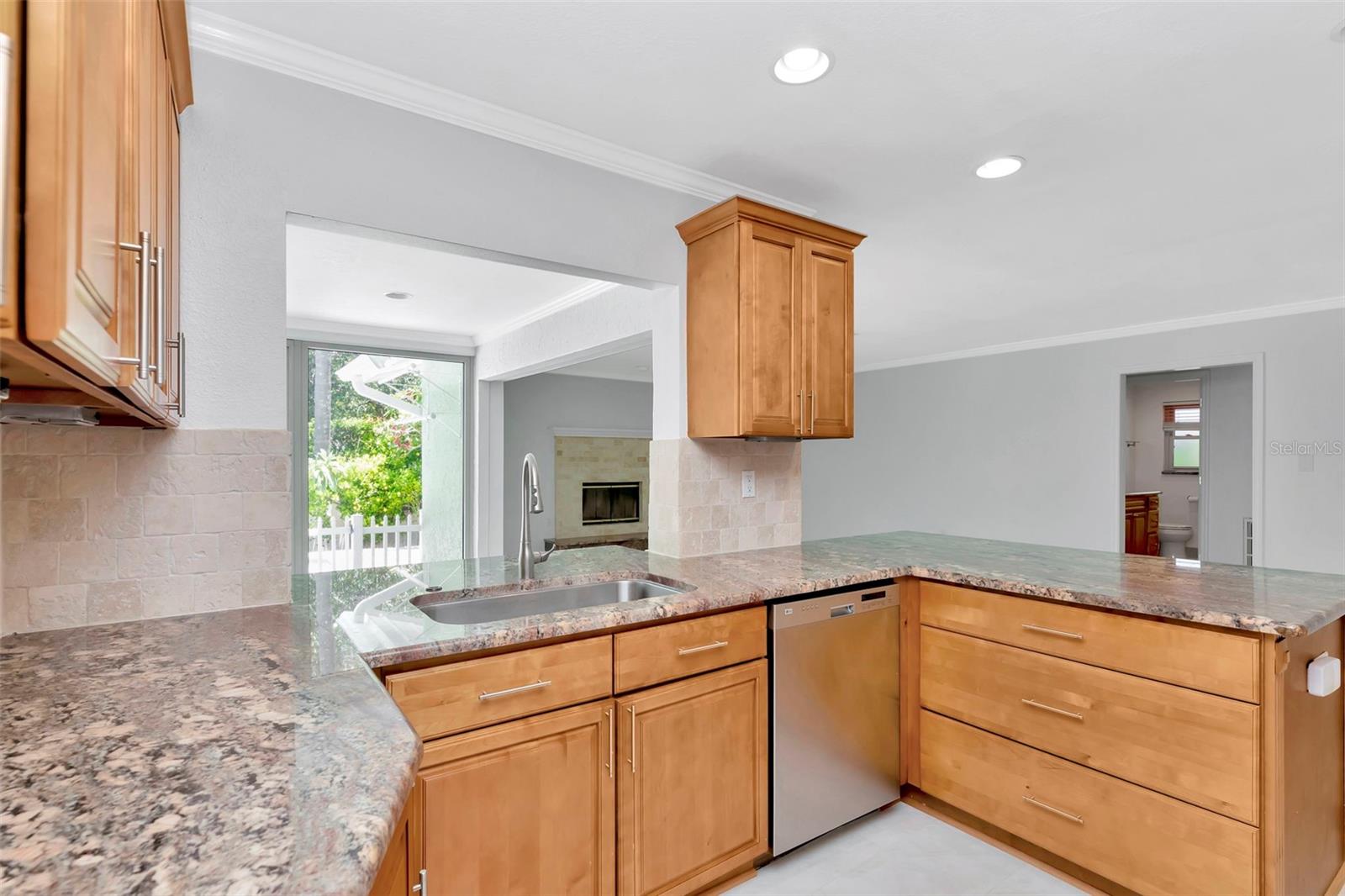 Kitchen towards Fl room and FR