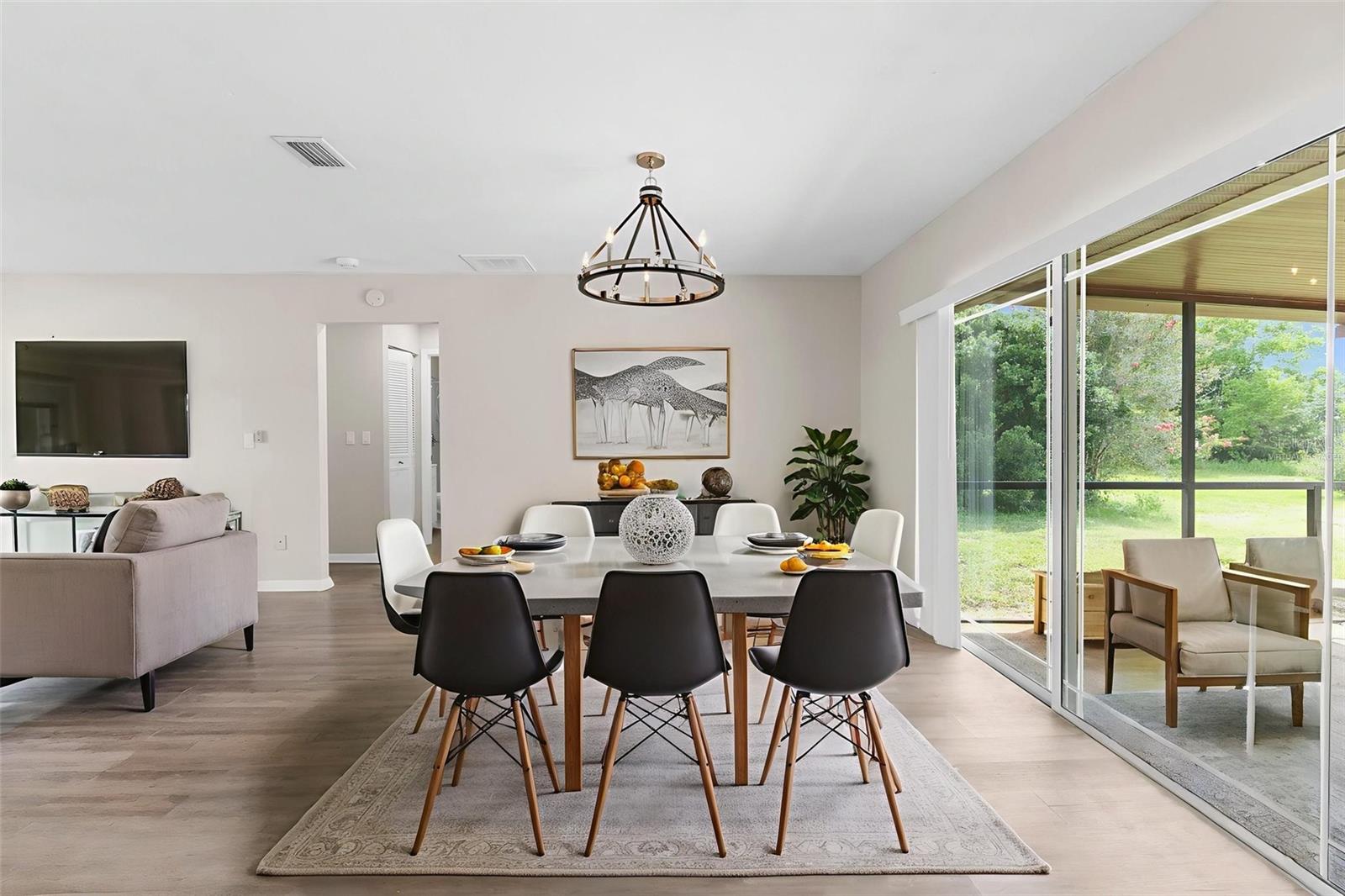 Virtually Staged- Dining area with oversized sliders.
