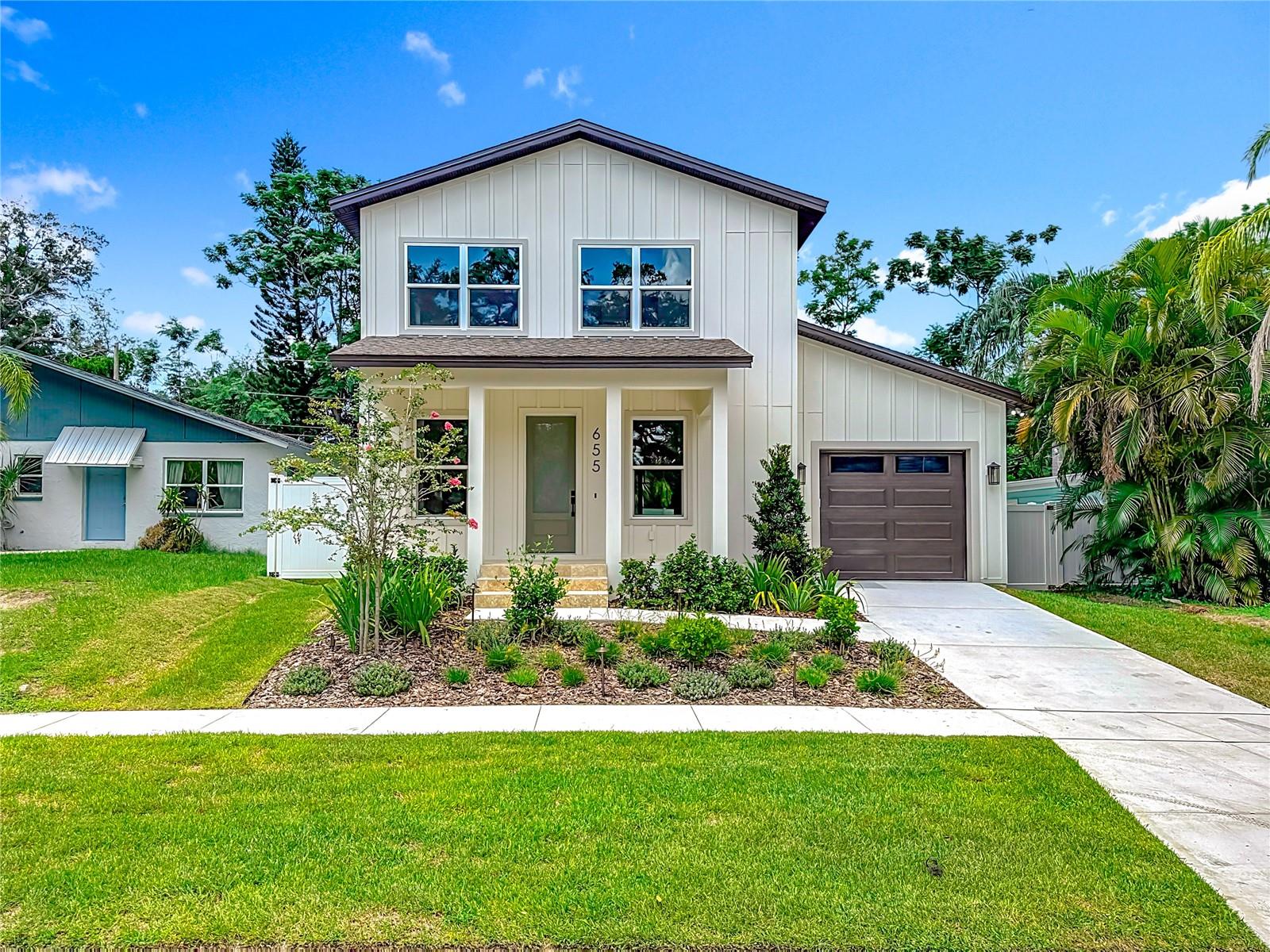 WELCOME HOME to this Modern farmhouse with great curb appeal in a lush, central location.