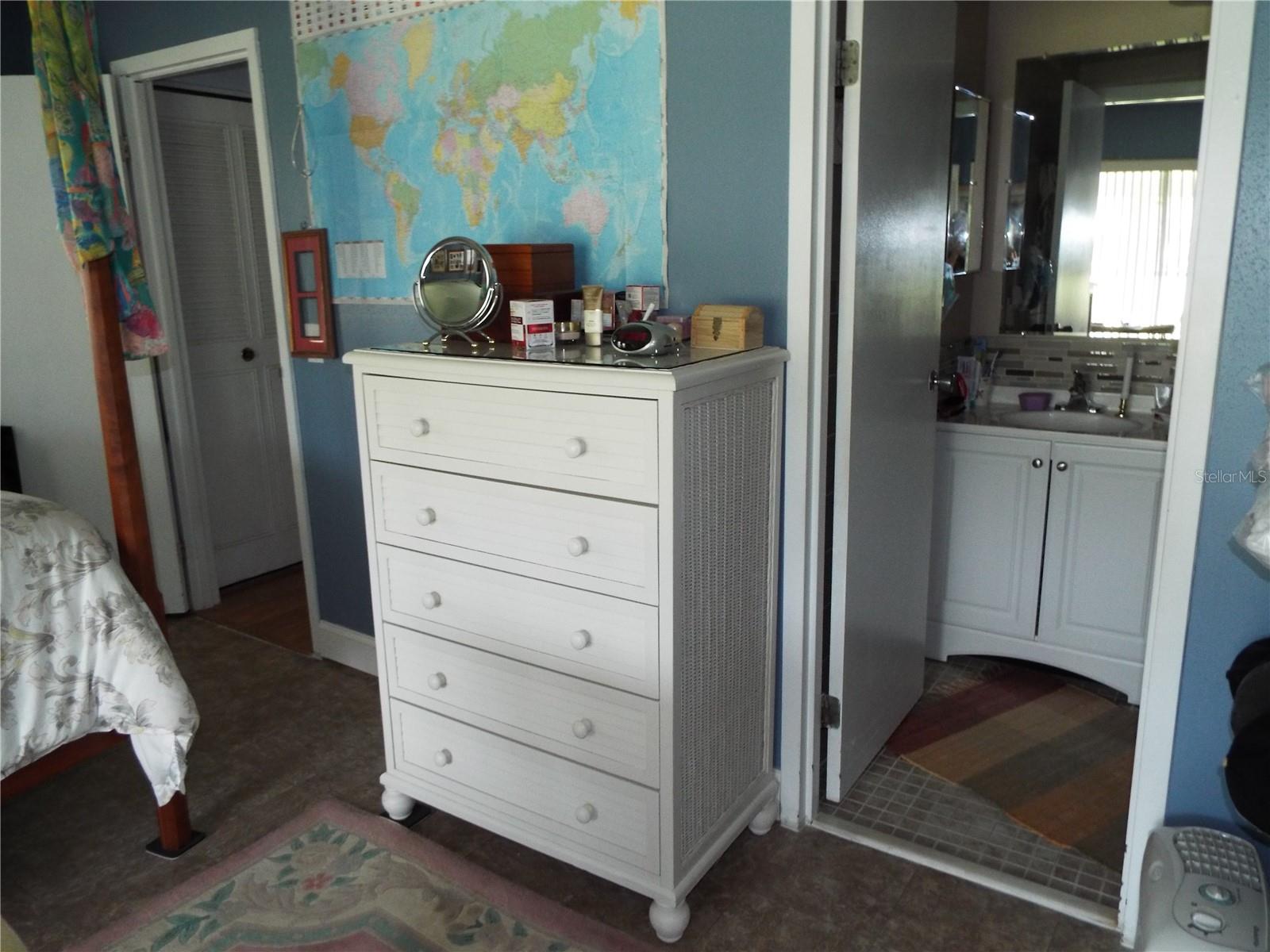 BEDROOM DOOR TO HALL WAY AND INTO THE BATHROOM IS ON THE RIGHT