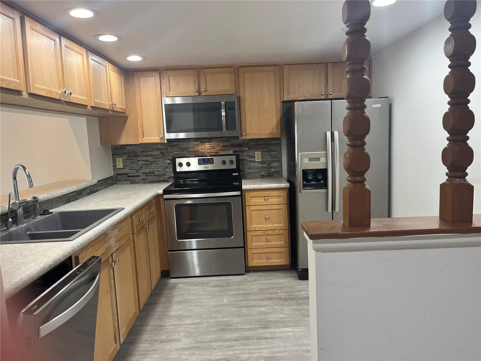 Welcoming kitchen, stainless steel appliances