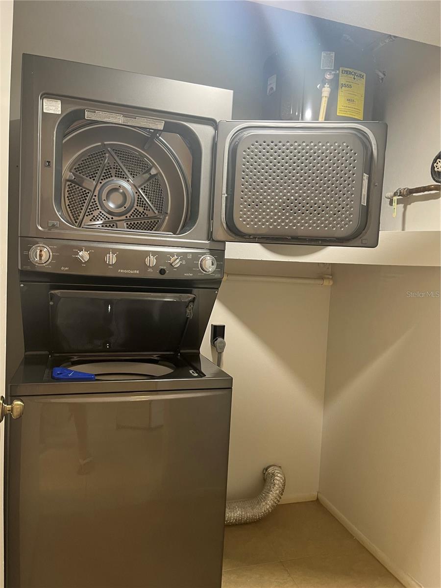 Full size stackable washer, dryer in laundry room