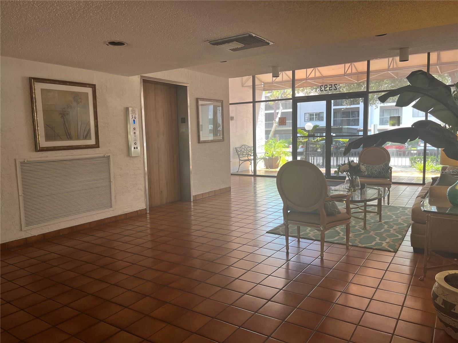 Another view of main lobby and elevator