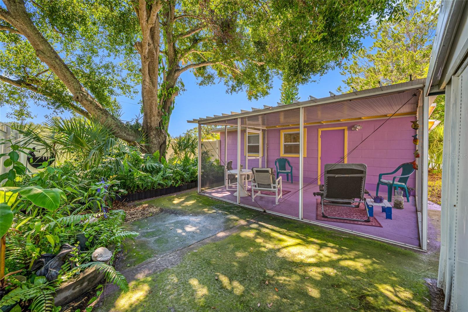 Private rear porch - a sanctuary where comfort meets the calm of nature