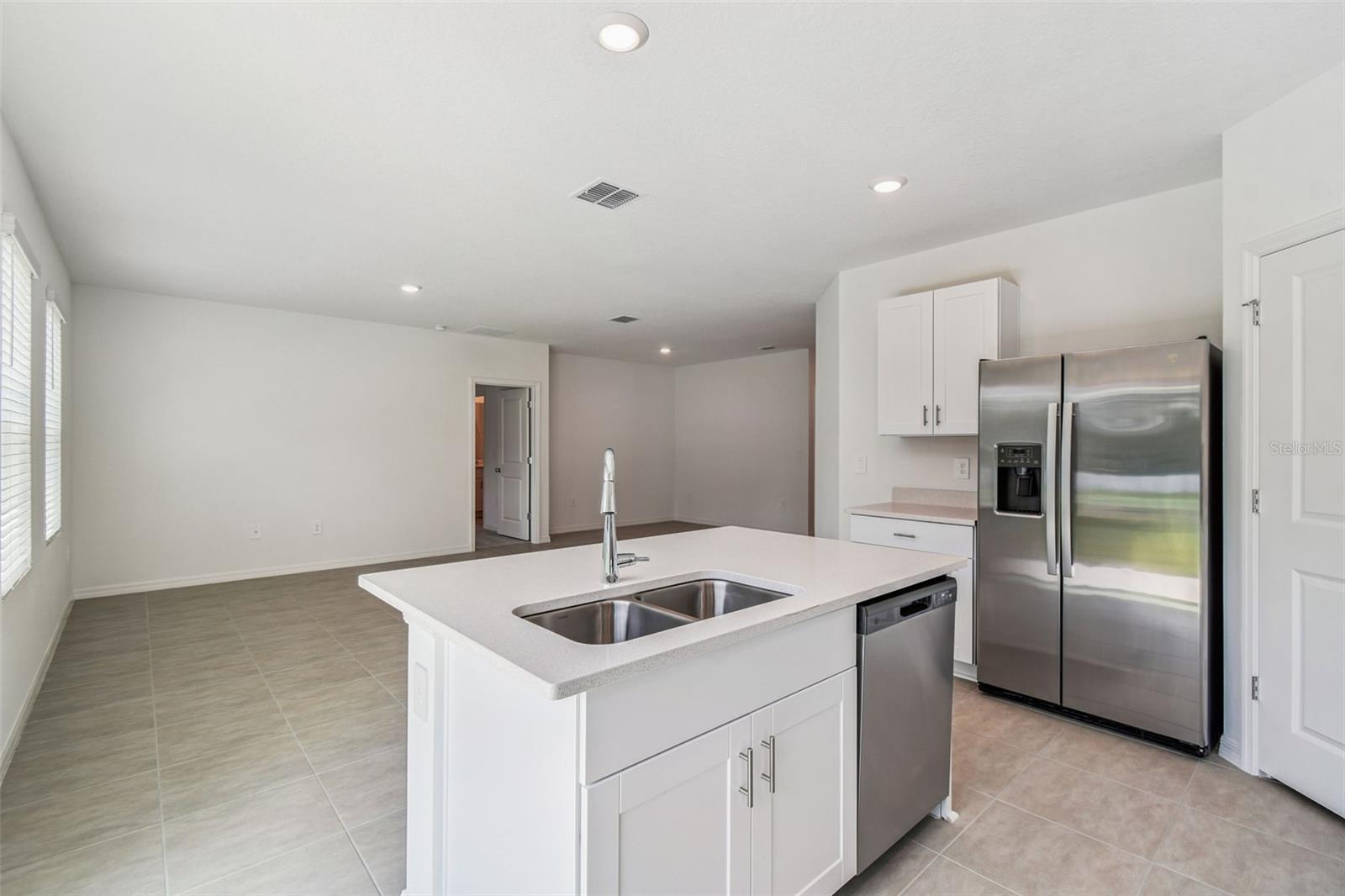 Kitchen Island that is open to Family Room