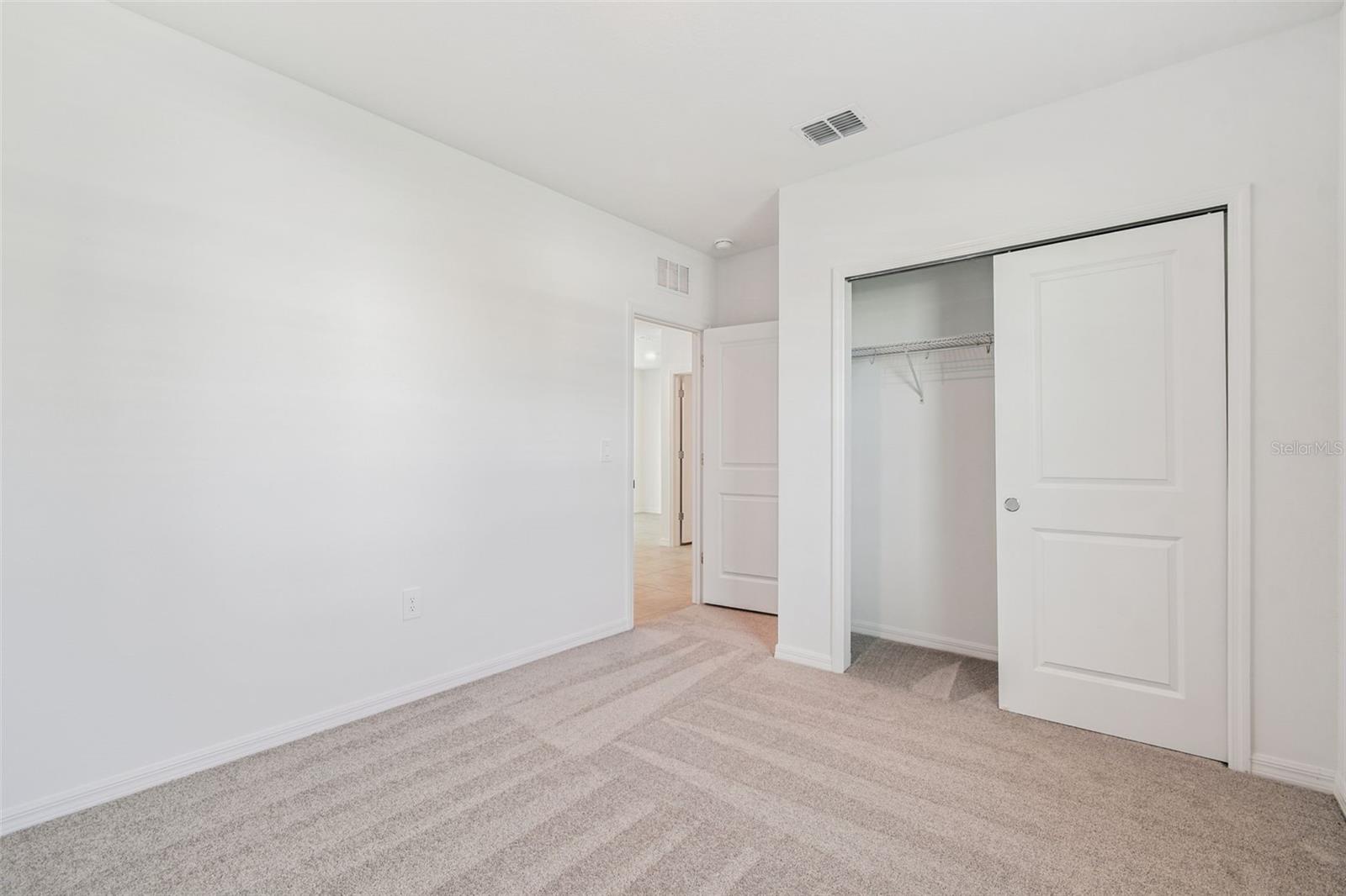 (Front) Bedroom #2 w/Wall Closet