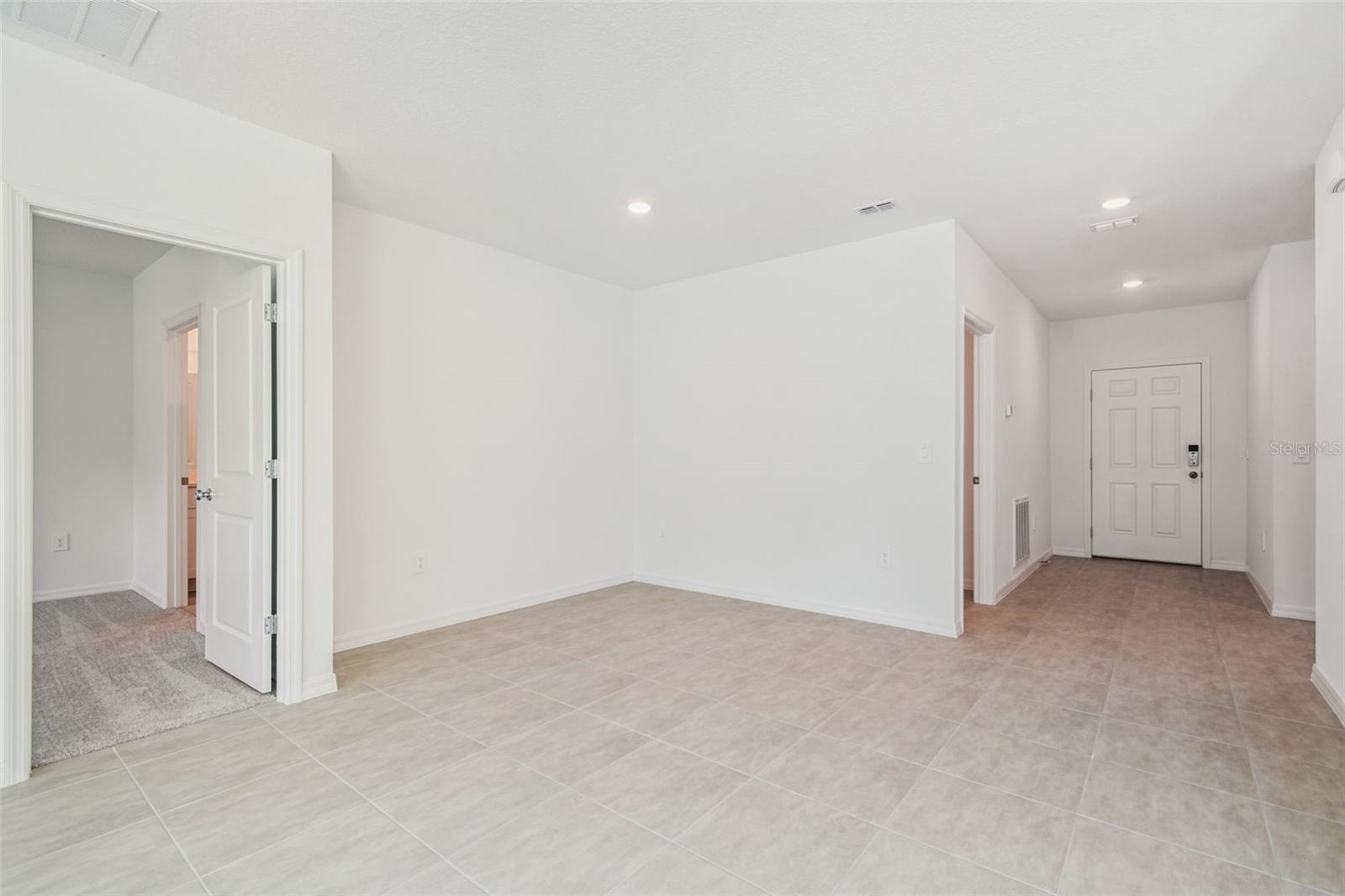 Dining Area, Entry to Primary Suite & Foyer