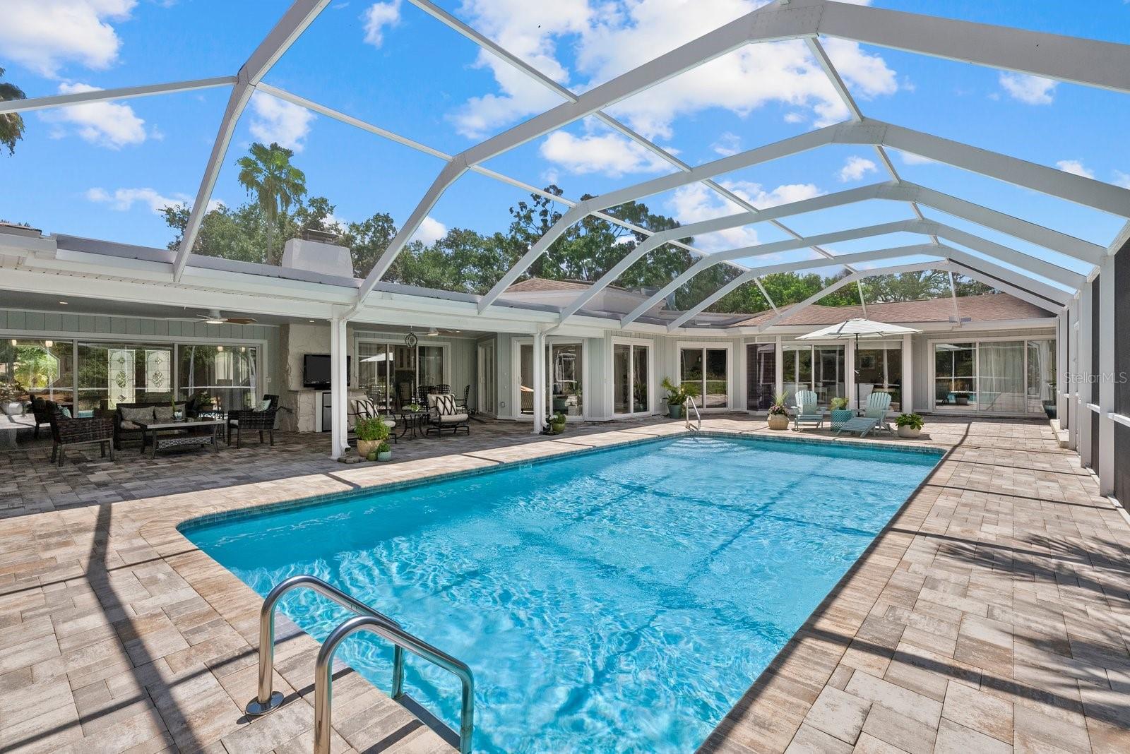 large pool, resurfaced with genuine PebbleTec