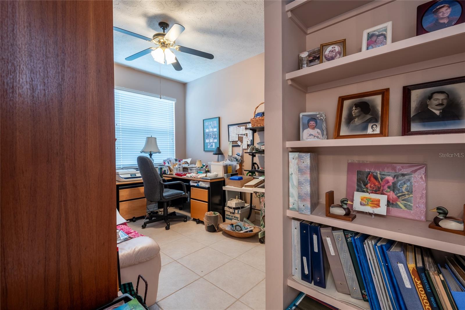 4th bedroom has built-in shelves. Makes a great office.