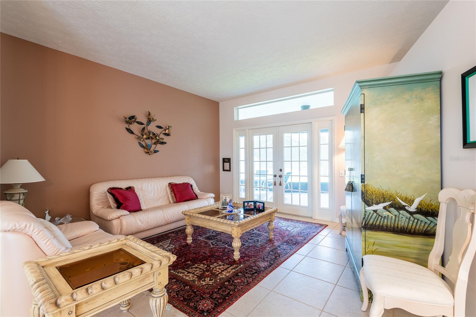 French doors in formal living room leading to lanai