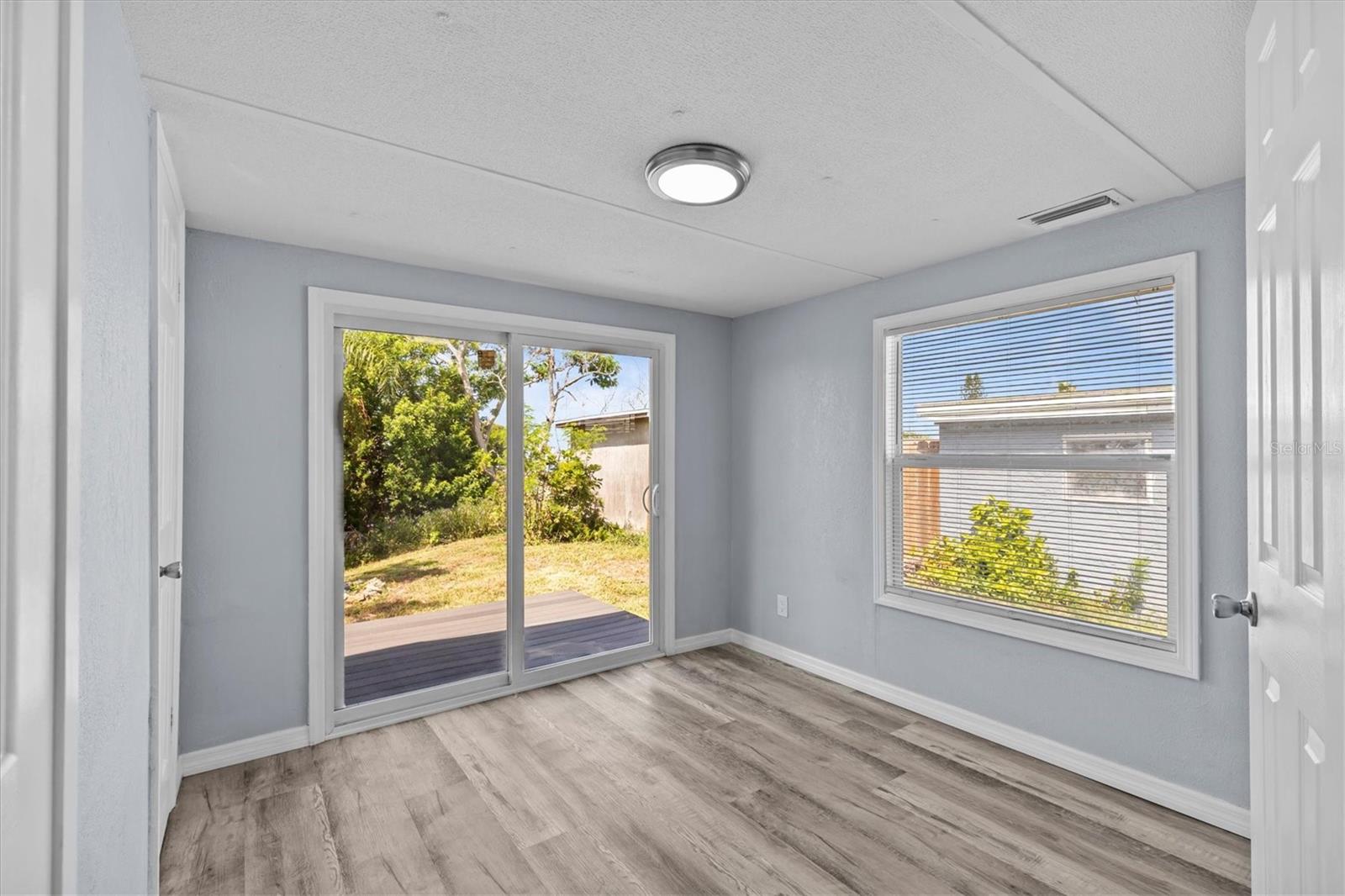 Lots of natural light and porch access.
