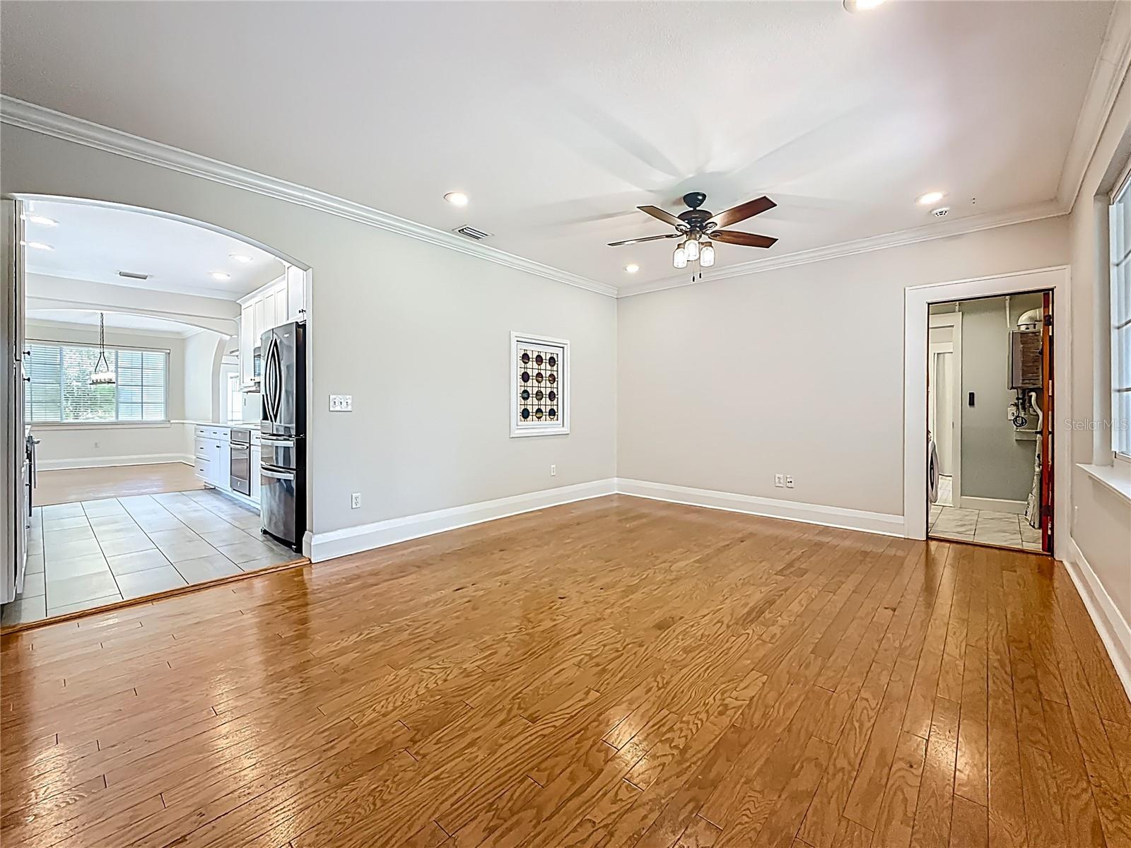 Family Rm w/ view of Kitchen to left, Laundry Rm on Right