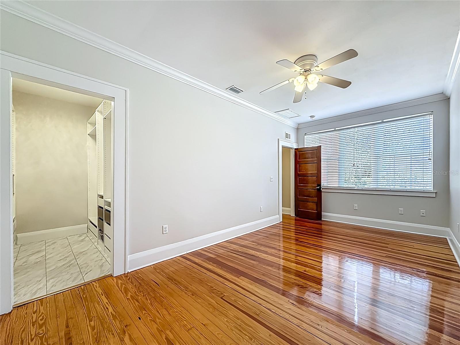 View of MBR w/ view of Closet and Entry Door