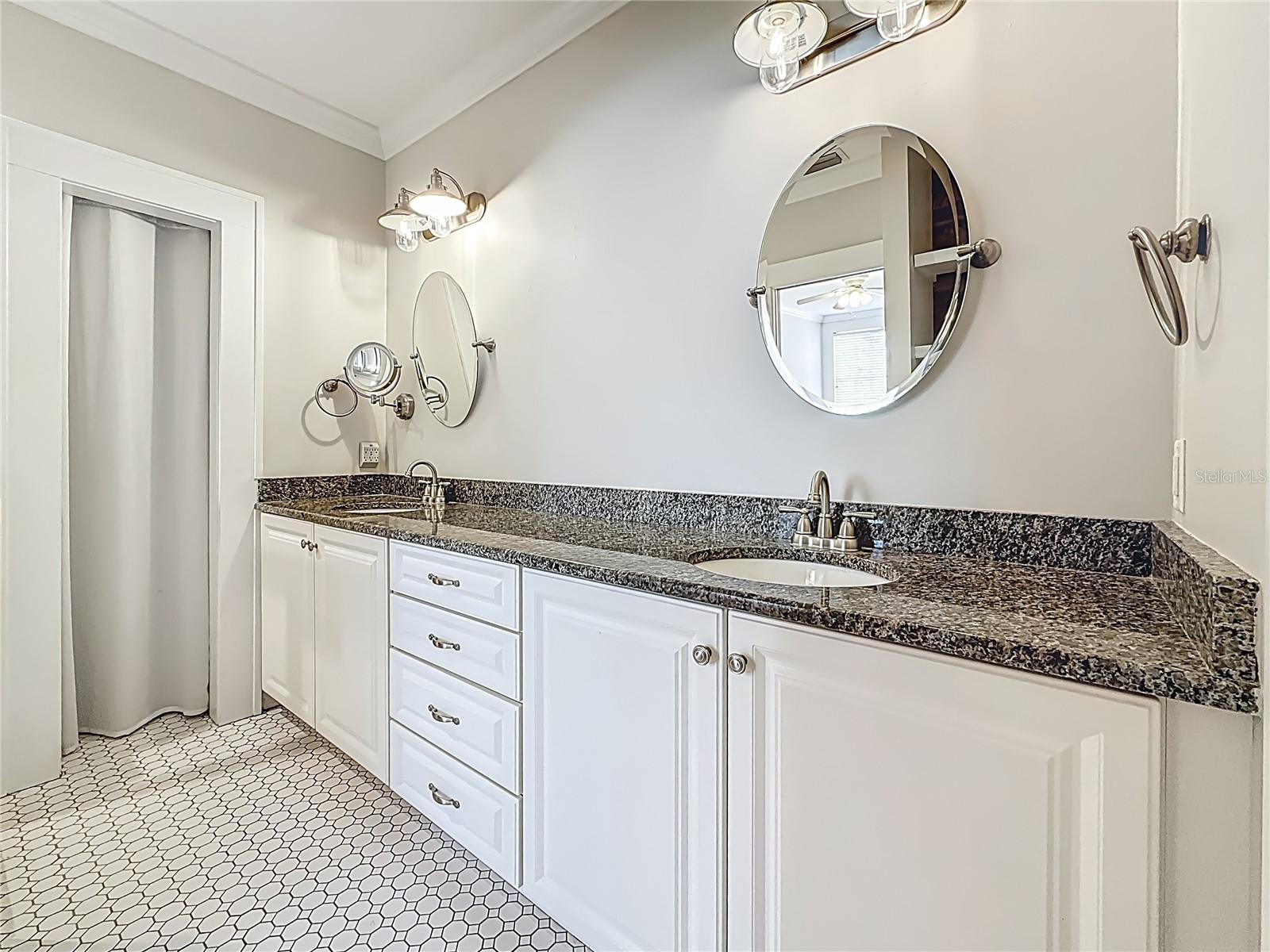 View of MBR Vanities, w/ Linen Closet in background