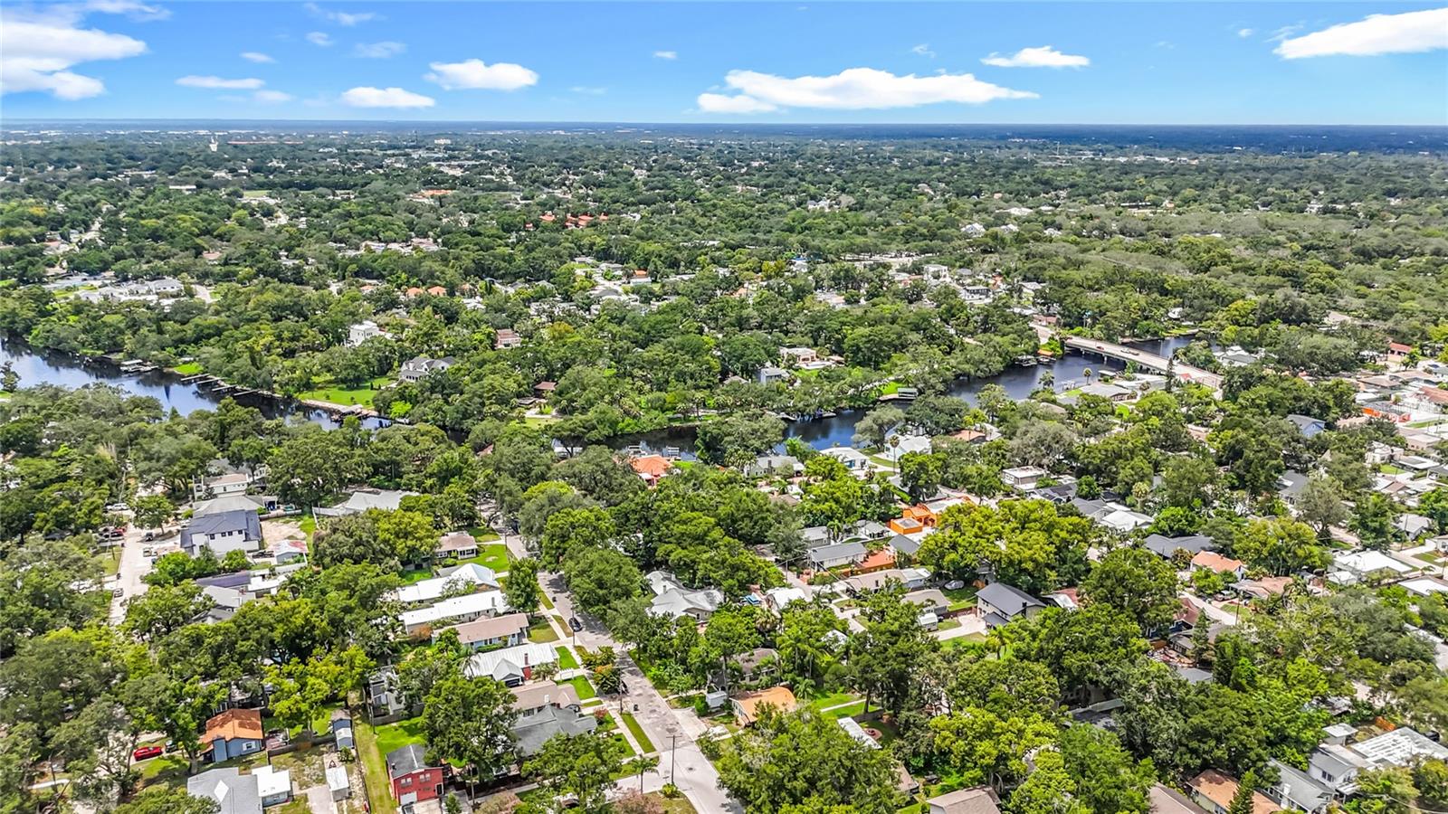 Subject in Foreground with Hillsborough River  in Center