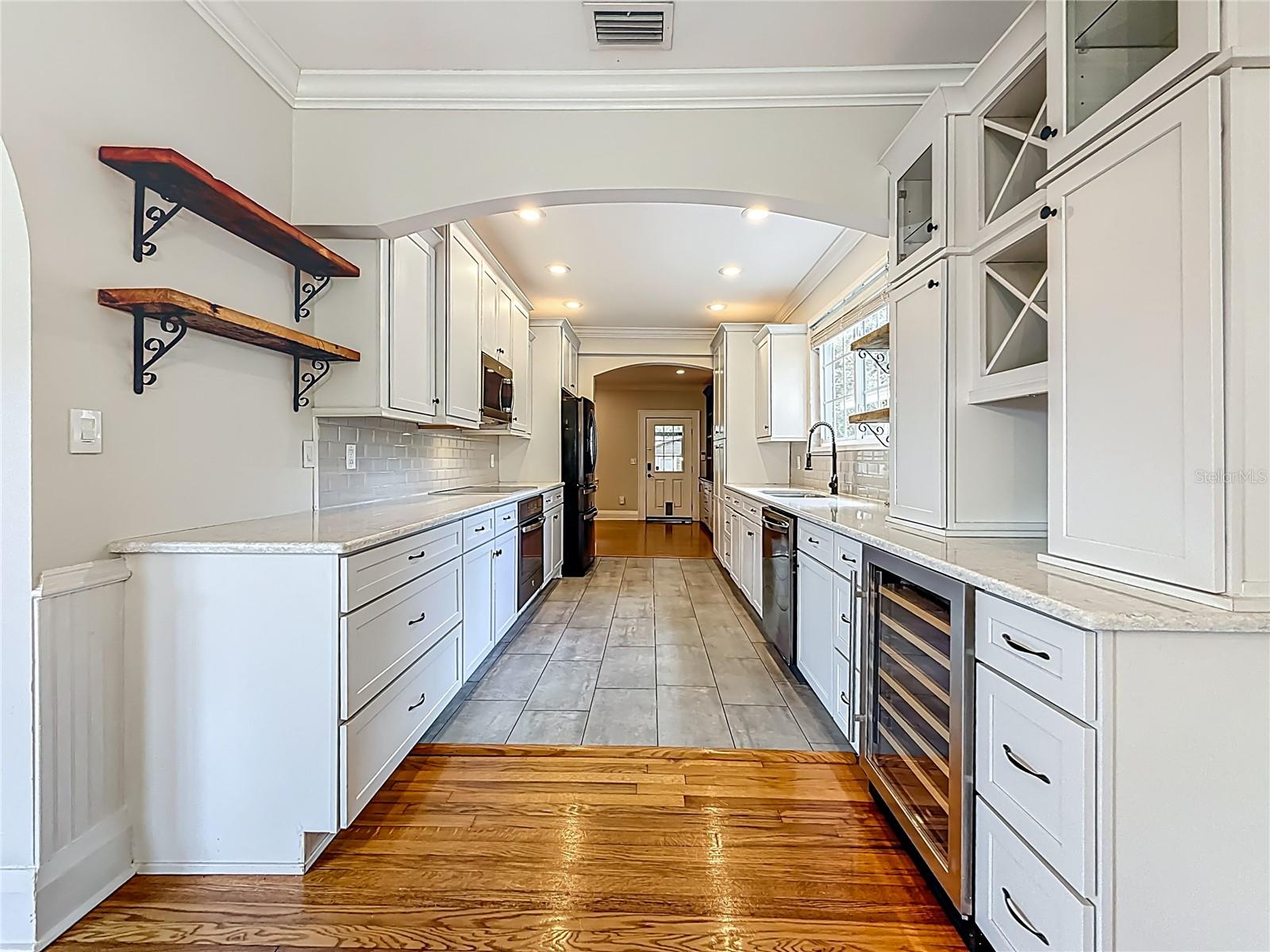 Kitchen with view of Family Rm and Back Door