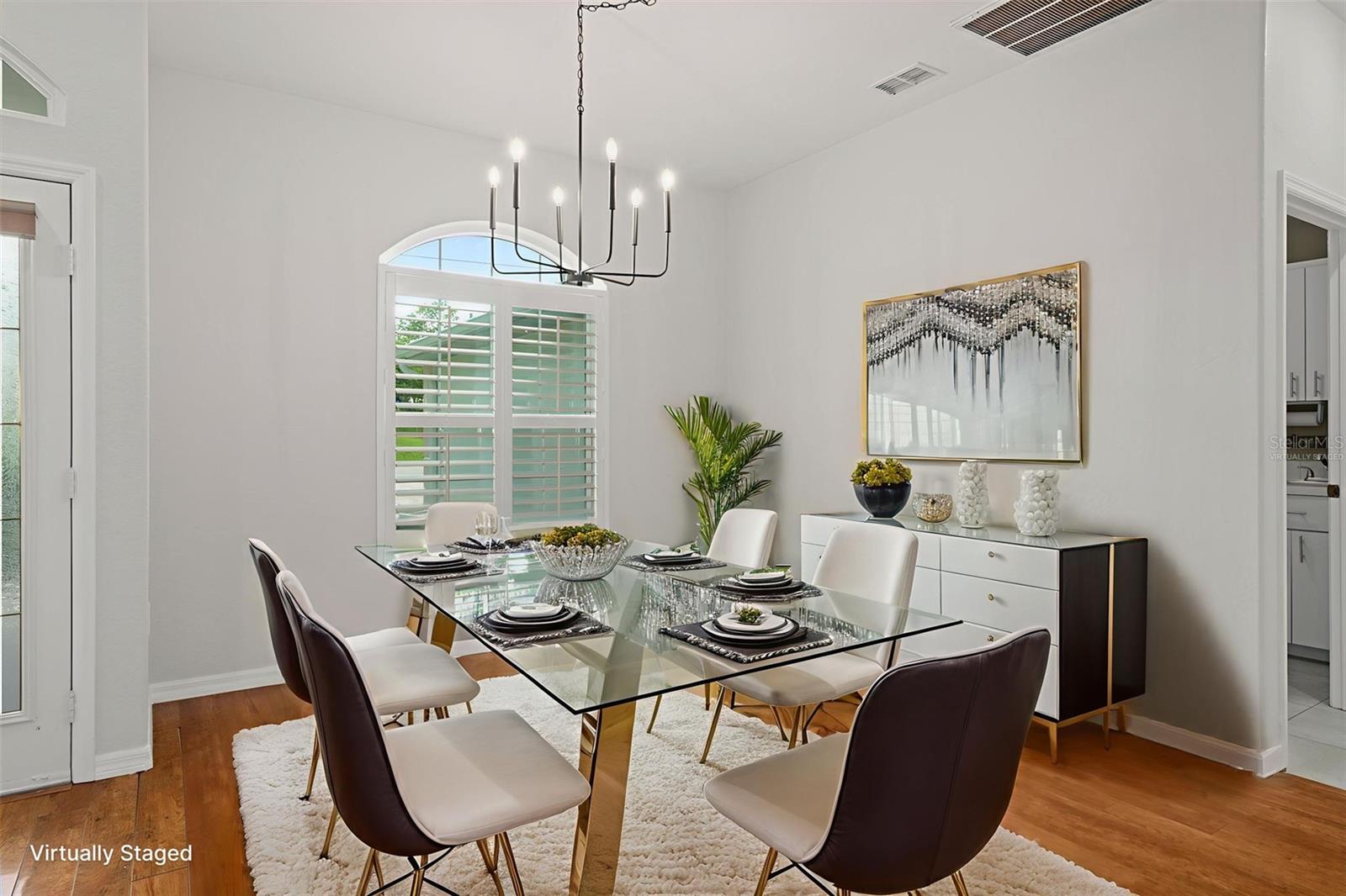 Virtually staged dinning room.
