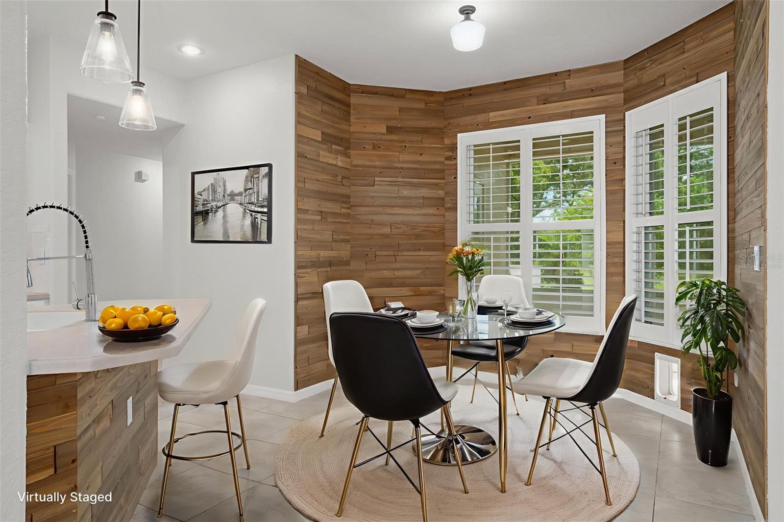 Virtually staged breakfast nook.