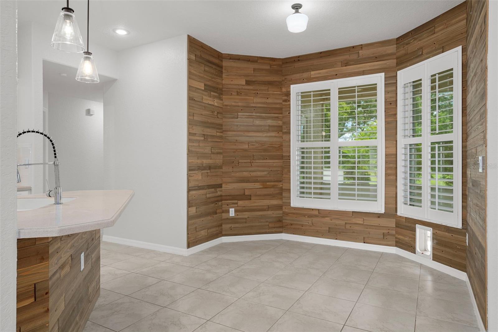 Gorgeous wood paneled breakfast nook!