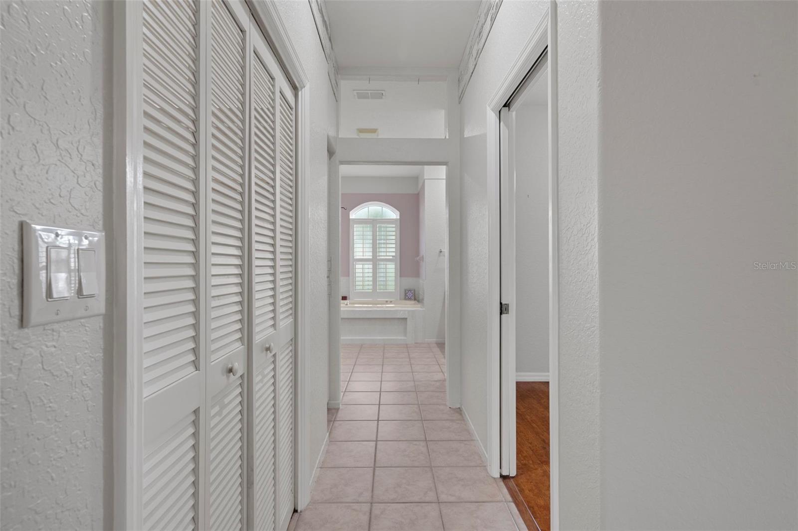 Hallway into the master bathroom.