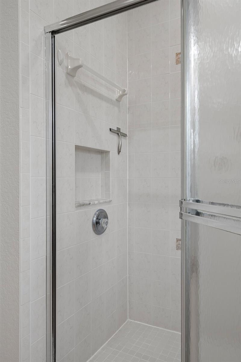 Beautiful tiled walk in shower.