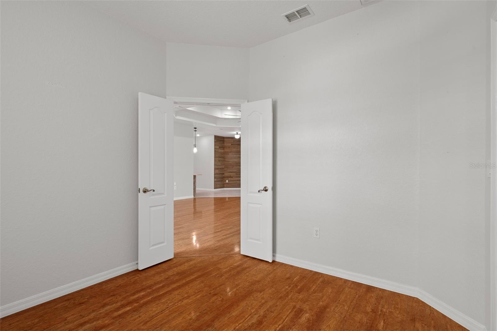 Double door entrance gives the bonus room all the elegance.