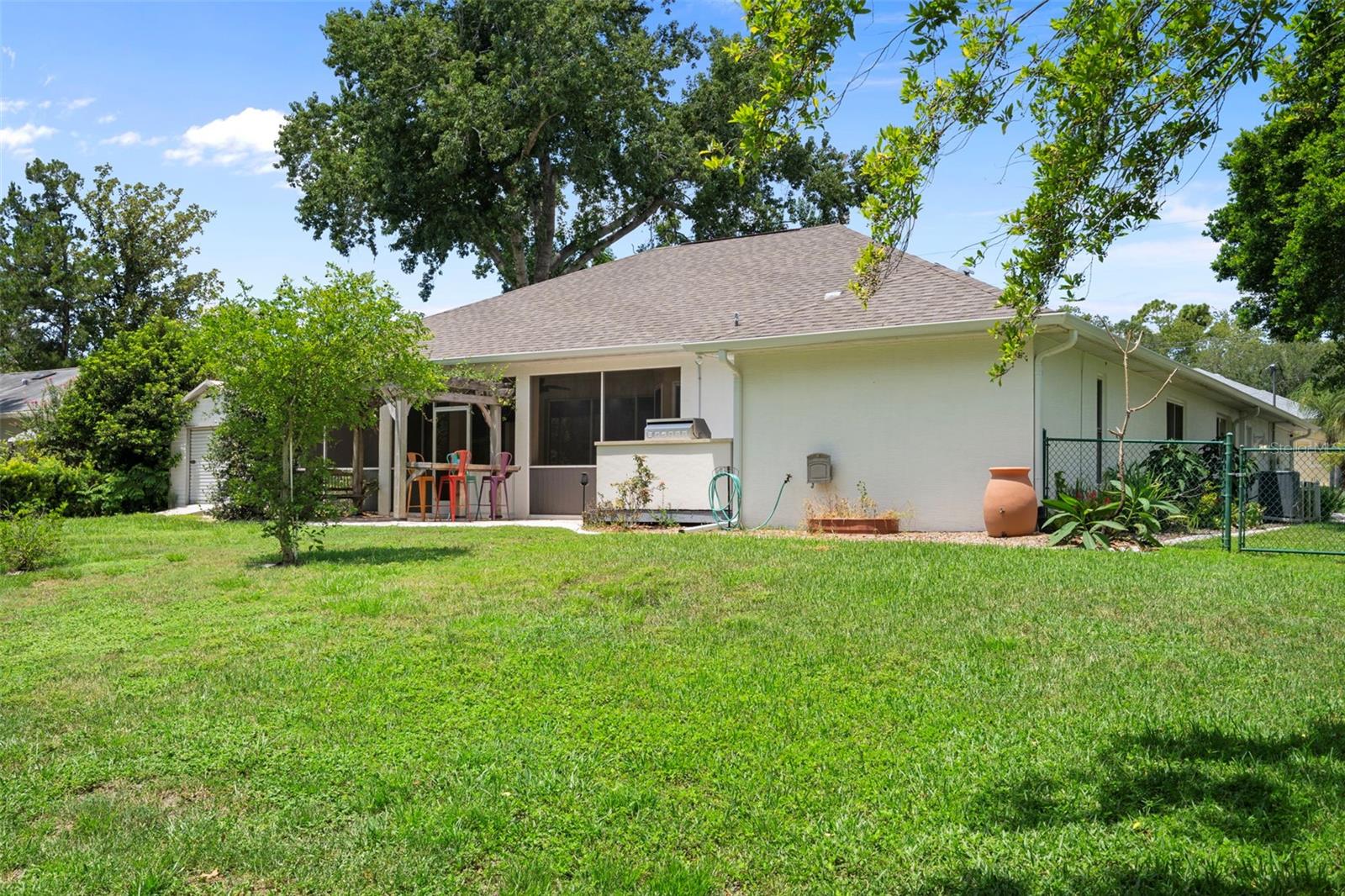 Spacious fenced in backyard perfect for those looking to garden.