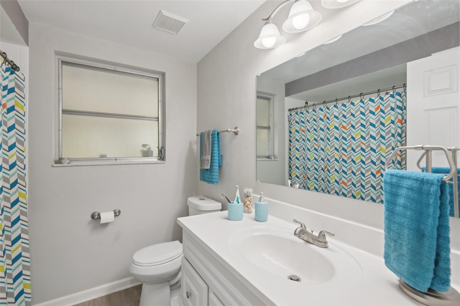 Guest Bathroom w/ tub and linen closet