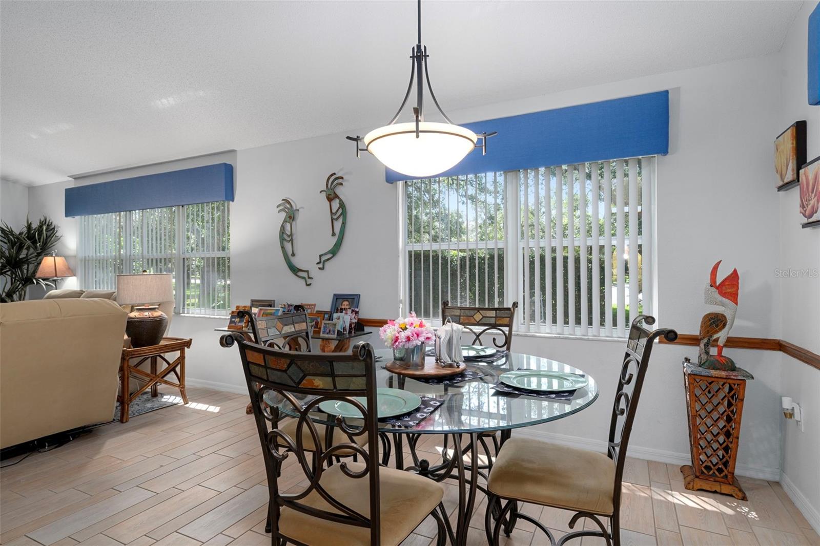 Breakfast nook located next to the kitchen with views of the backyard.