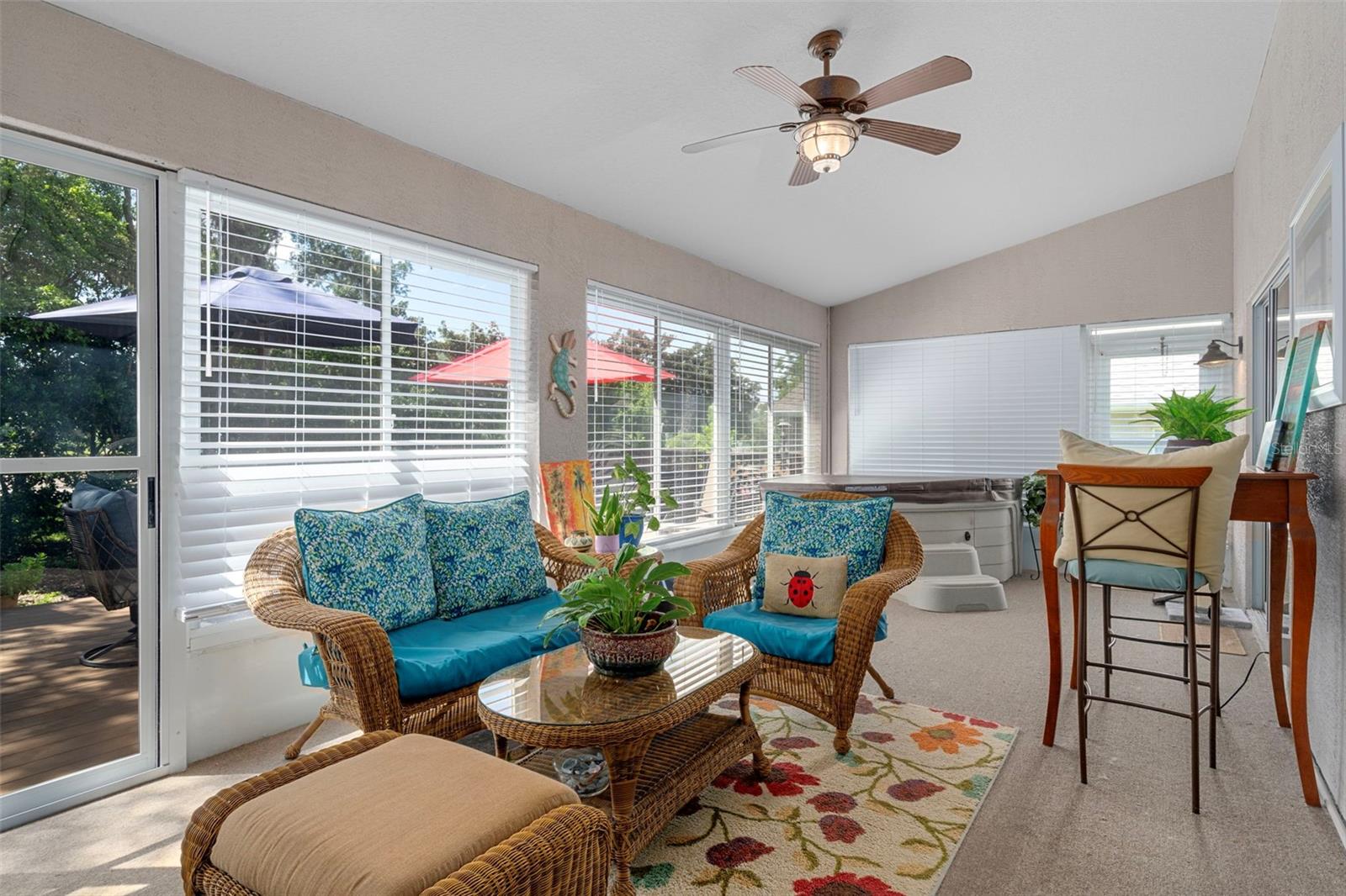 Large Florida room with well maintained newer glass windows 2022, all the way down.