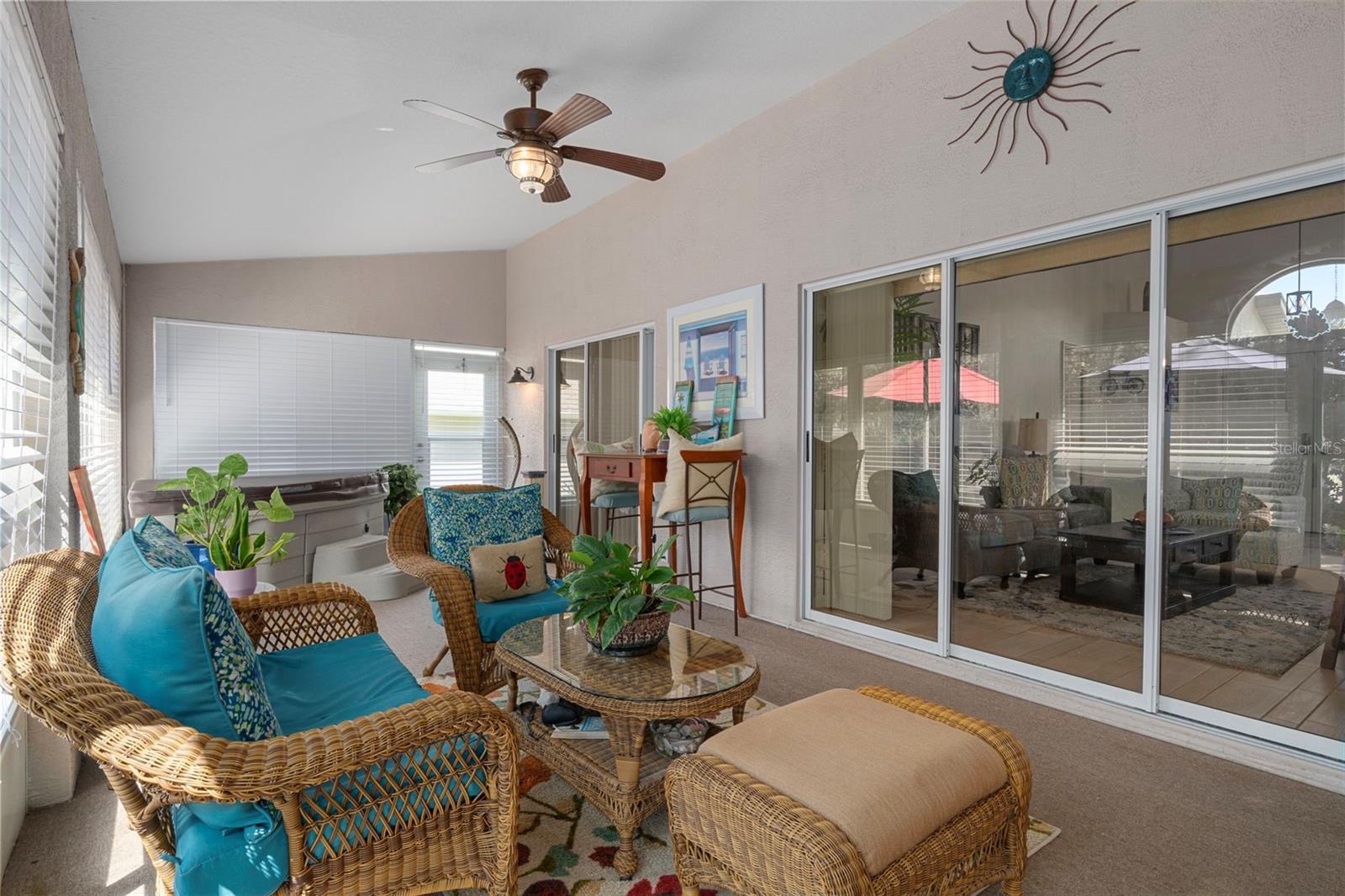 You can enter the Florida room from the primary bedroom or living room.