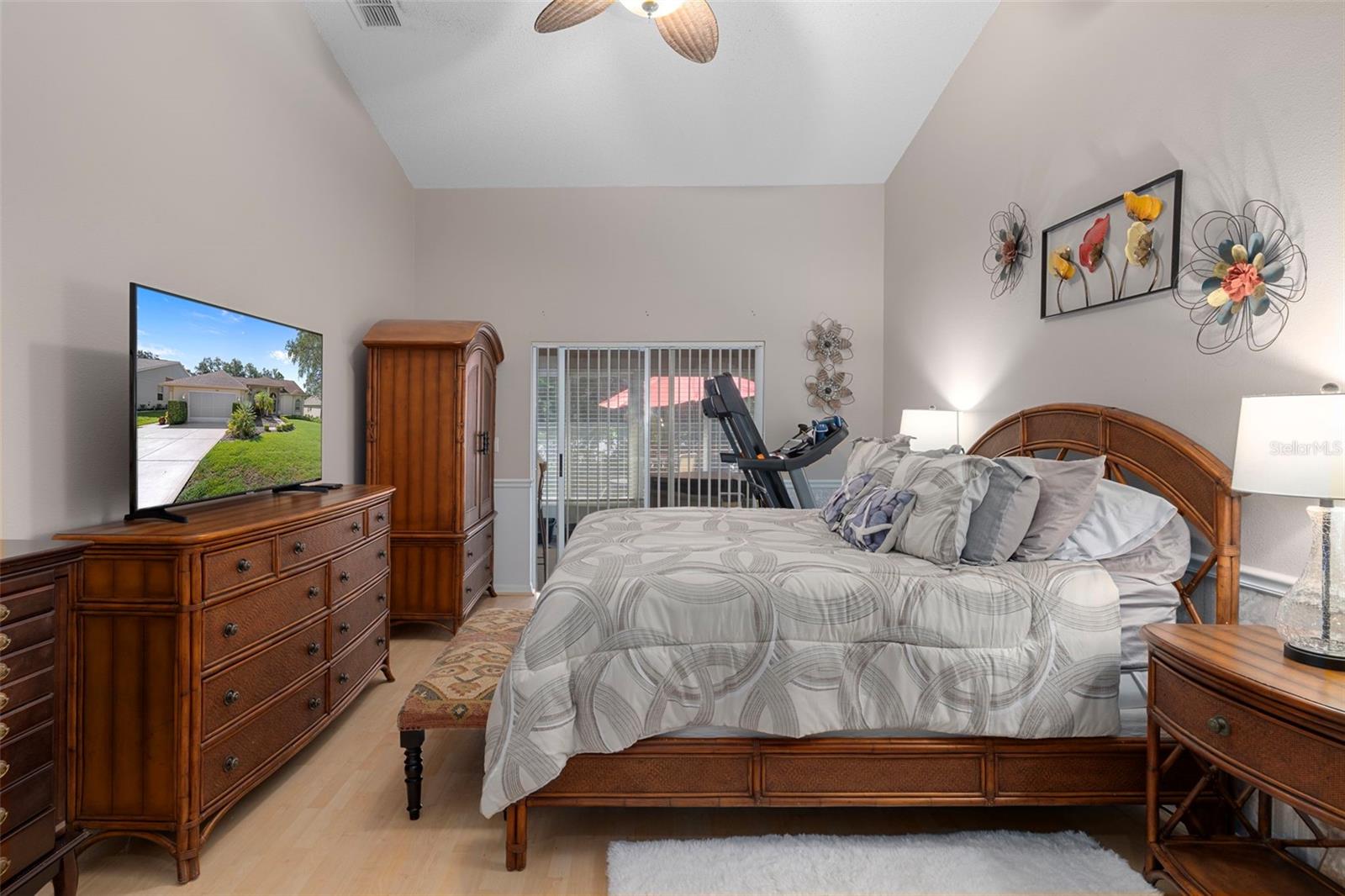 Just image crawling into bed after a long day in this cozy master bedroom.