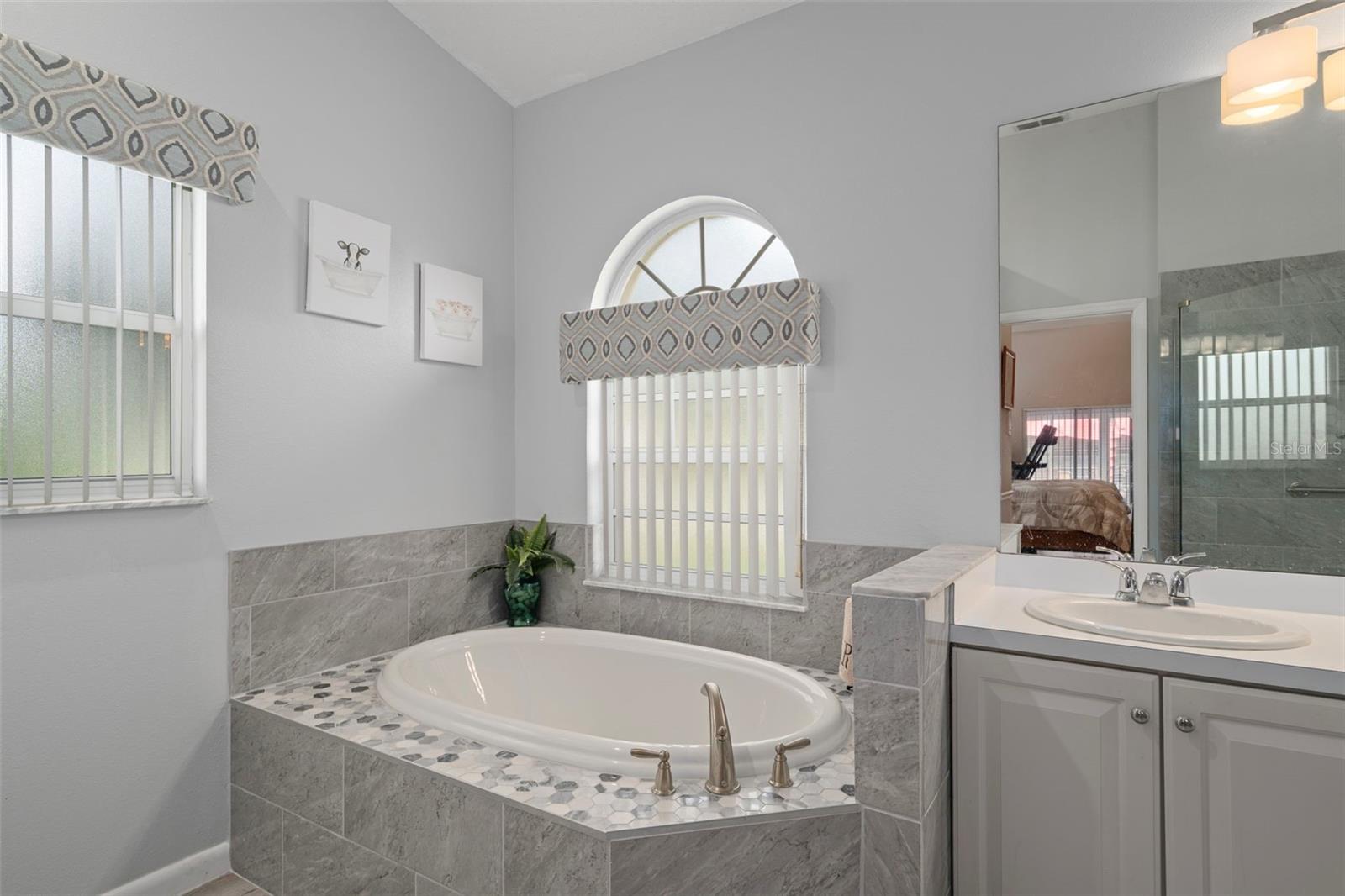 After a long day enjoy the relaxation of this spacious tub.