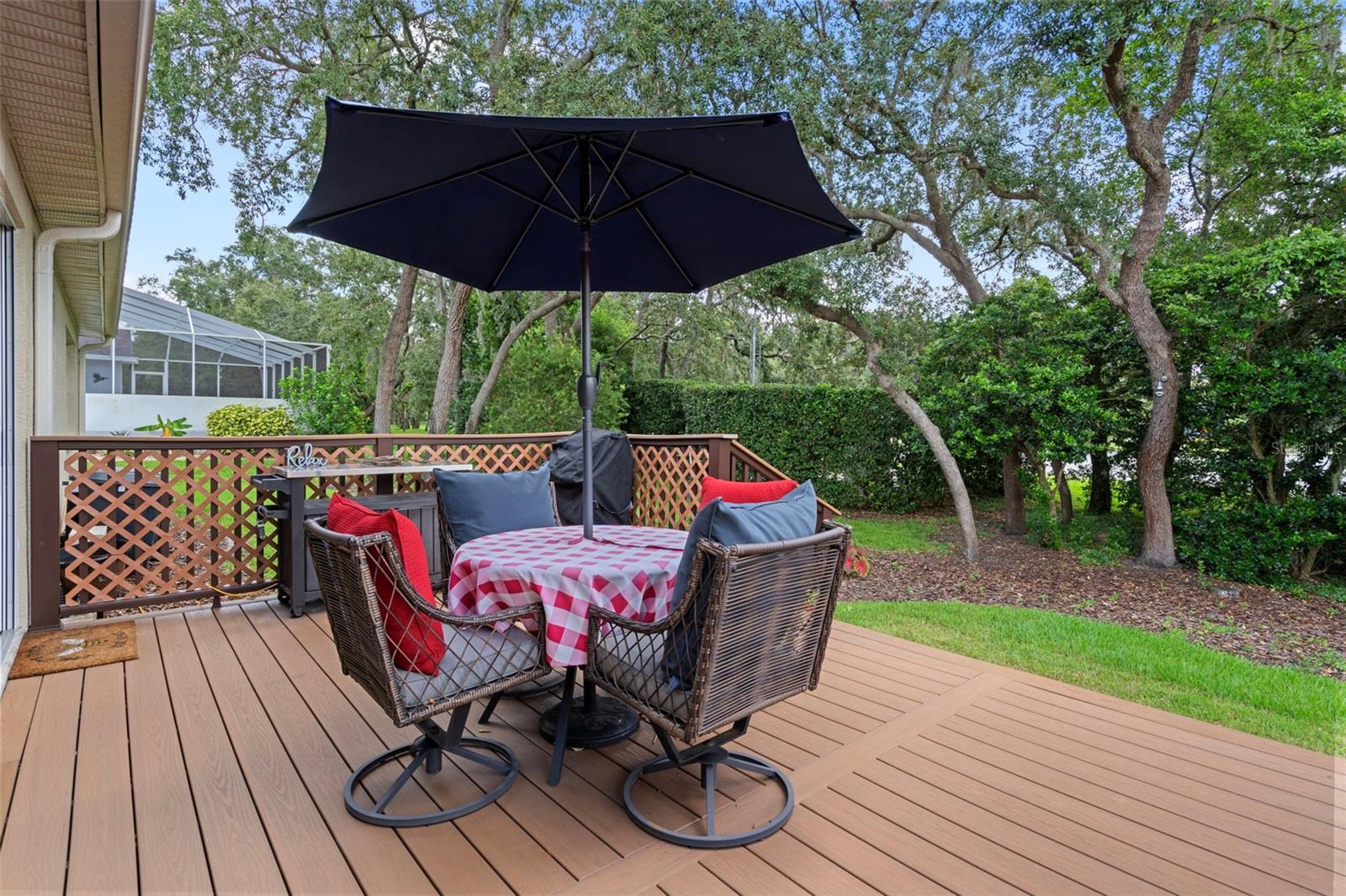 The Oversize deck overlooks the gorgeous landscaped backyard.