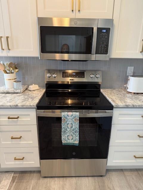 Brand new GE appliance pkg.  All furnishings convey.