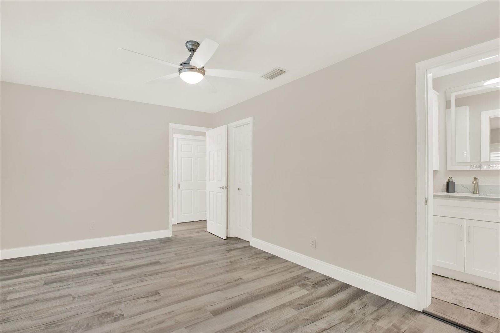 Primary bedroom with updated everything (fans are remote control)  Ensuite bath
