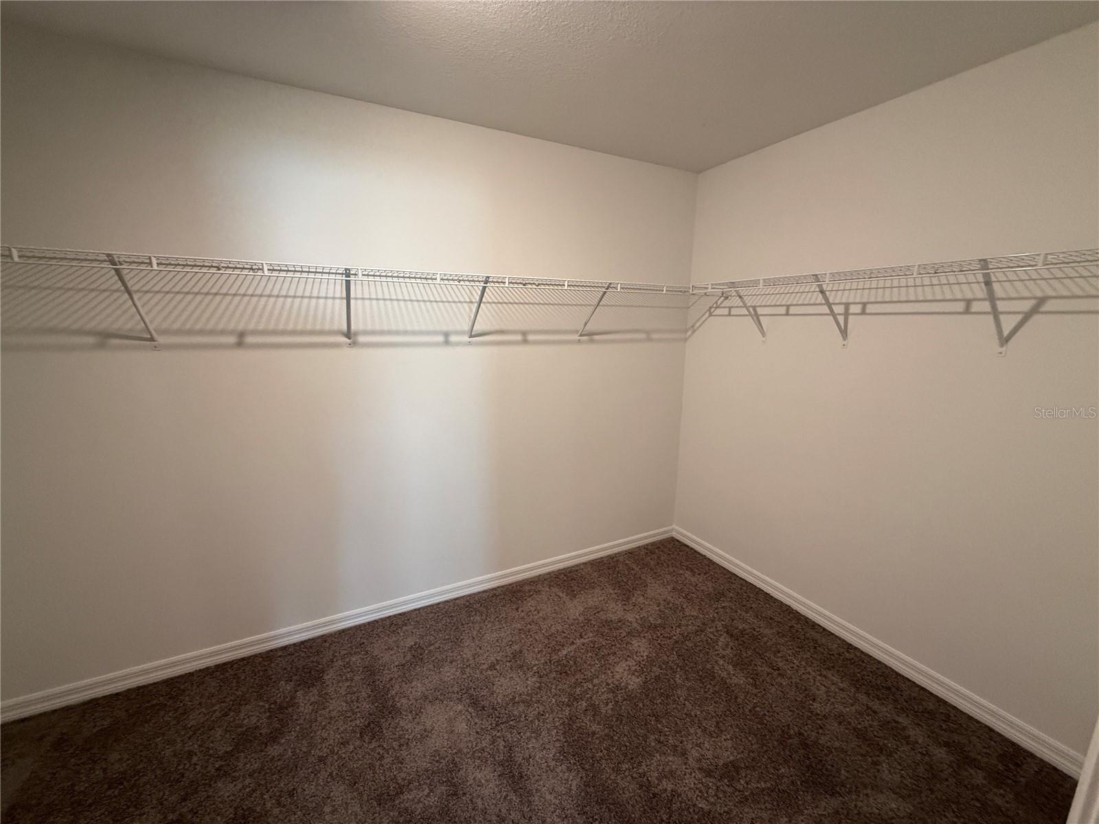 walk-in closet in primary bedroom.