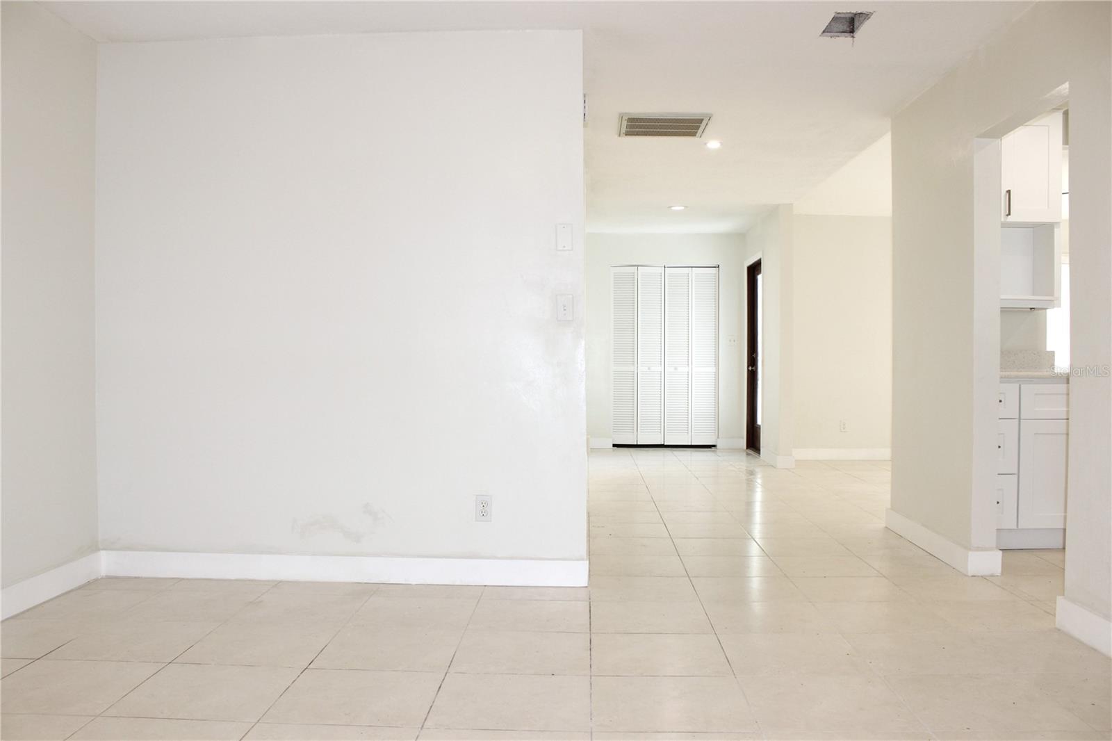 VIEW FROM FAMILY ROOM TO ENTRANCE