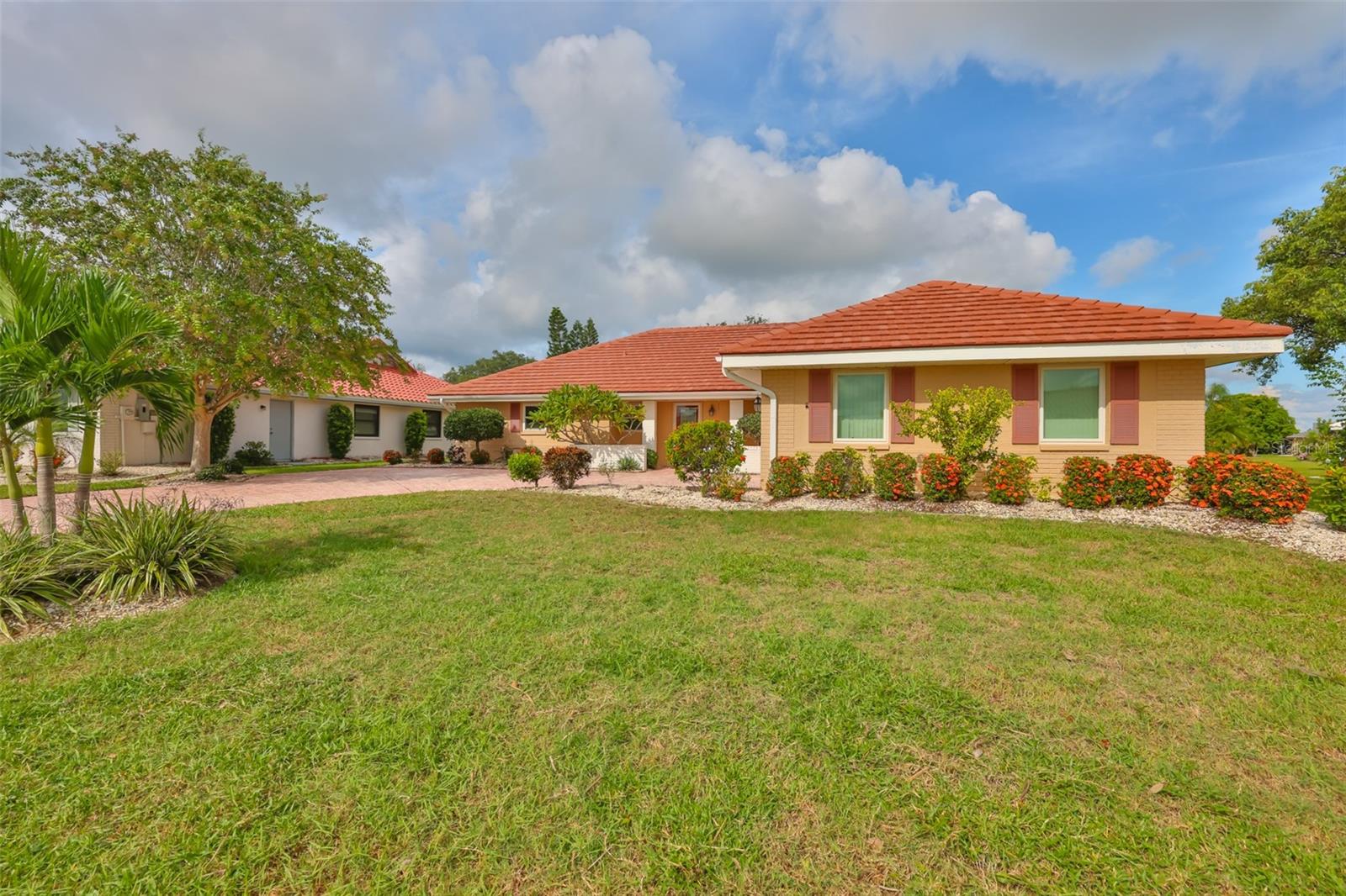 Right side view of your next home with long lasting barrel tile roof!